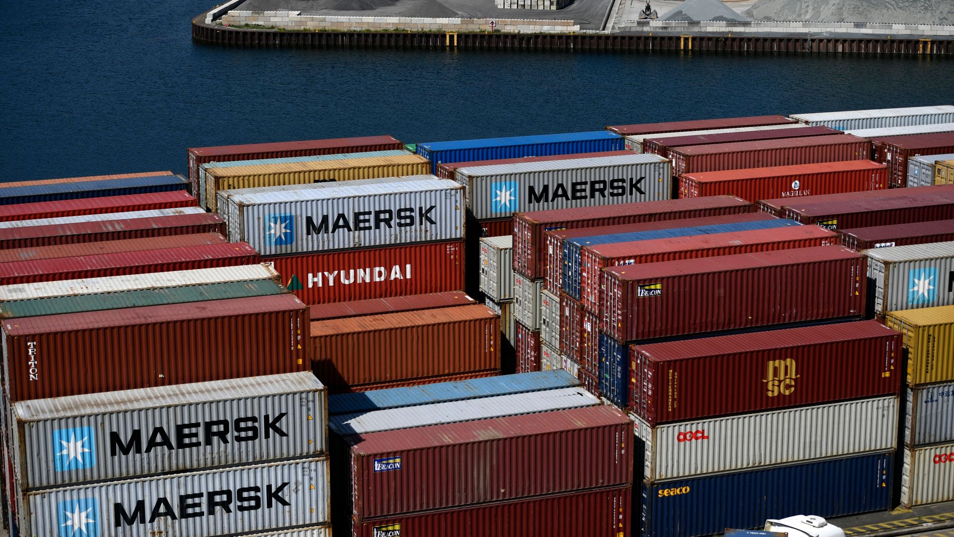 A photo of Maersk containers at a shipping yard