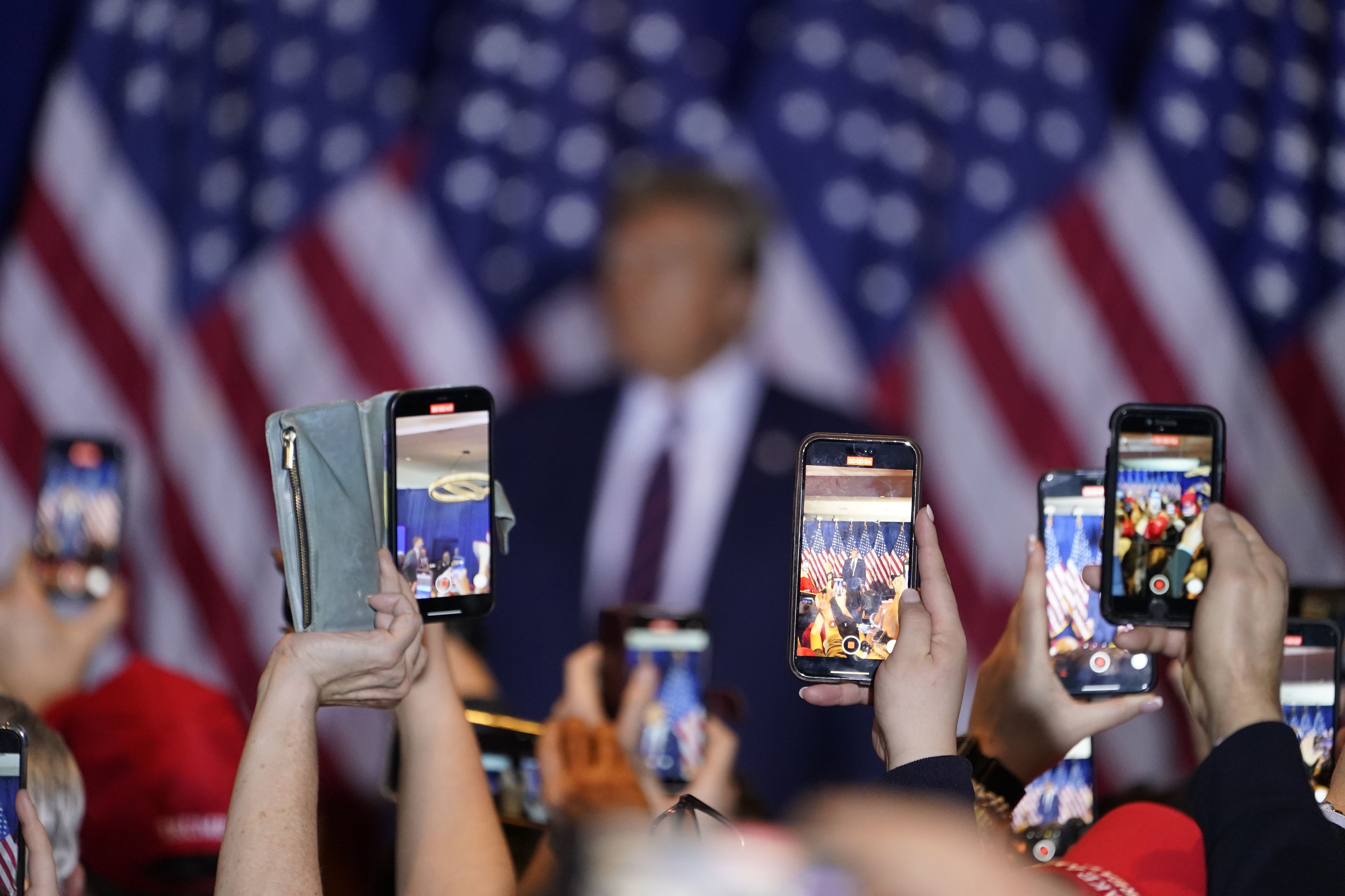 Former President Trump speaks at his primary-night rally in Nashua, N.H., on Tuesday.