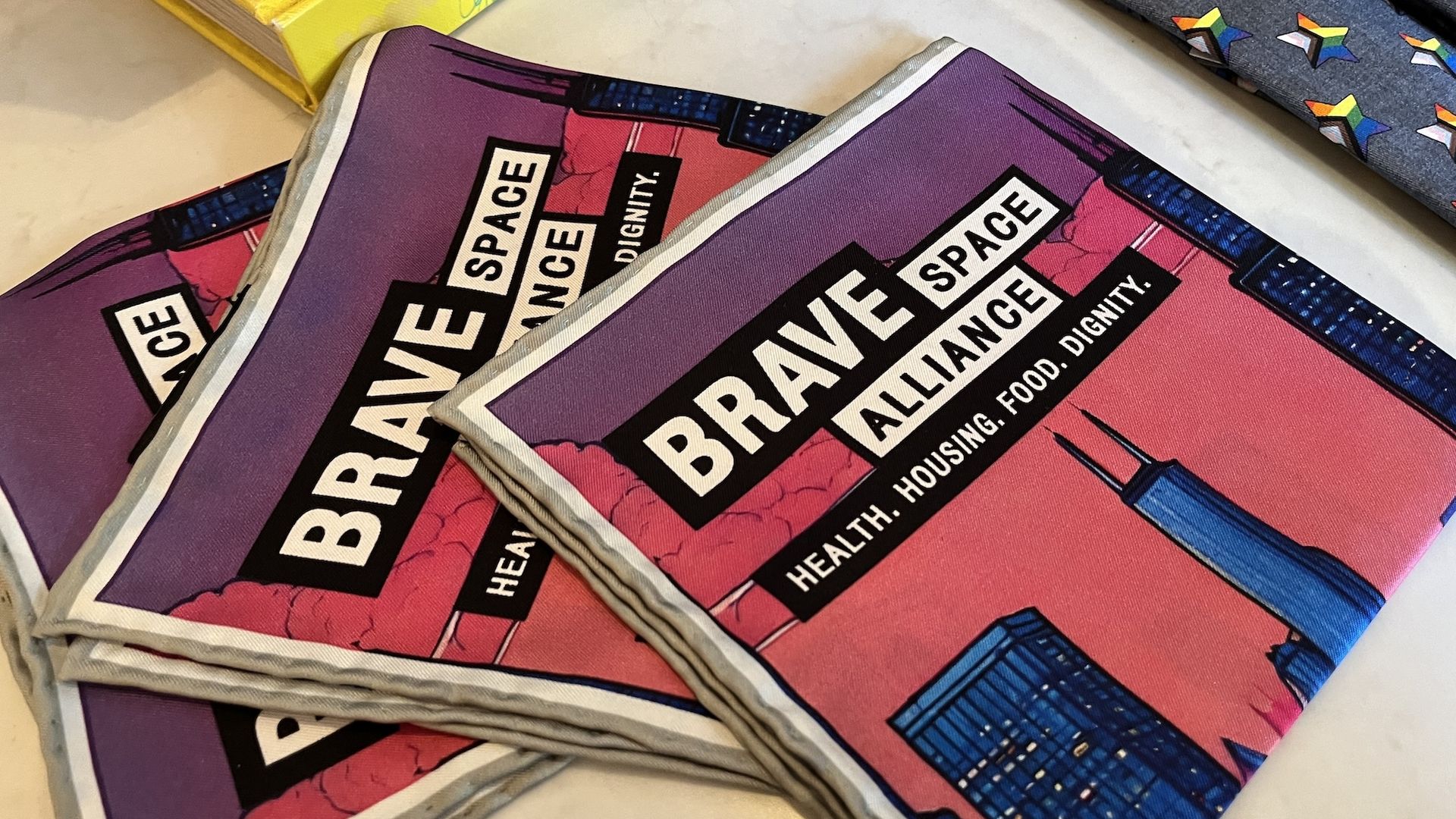 Photo of a blanket with the words "Brave Space Alliance" written on it 