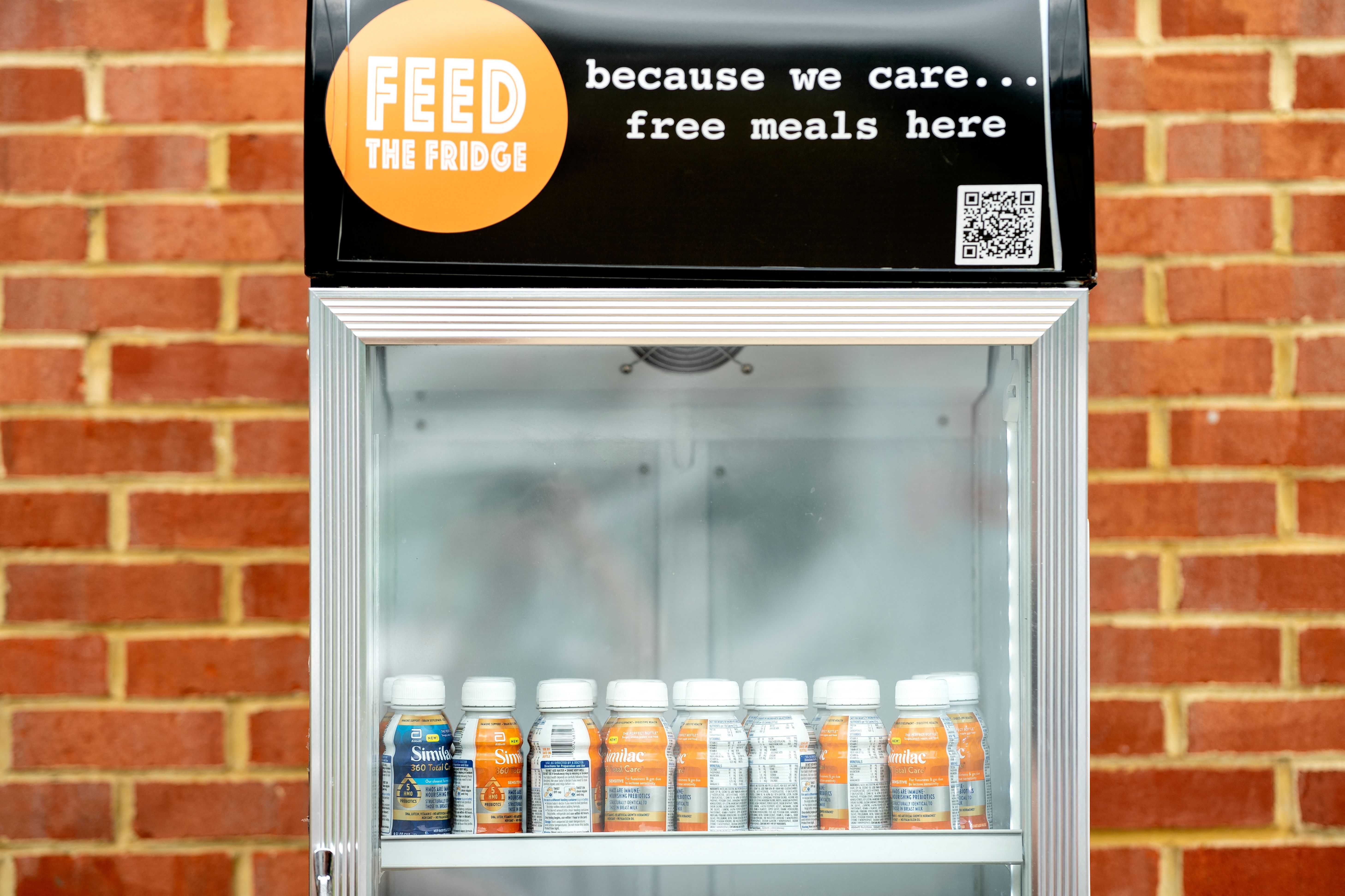 Photo shows a fridge labeled with "Feed the Fridge" at the top