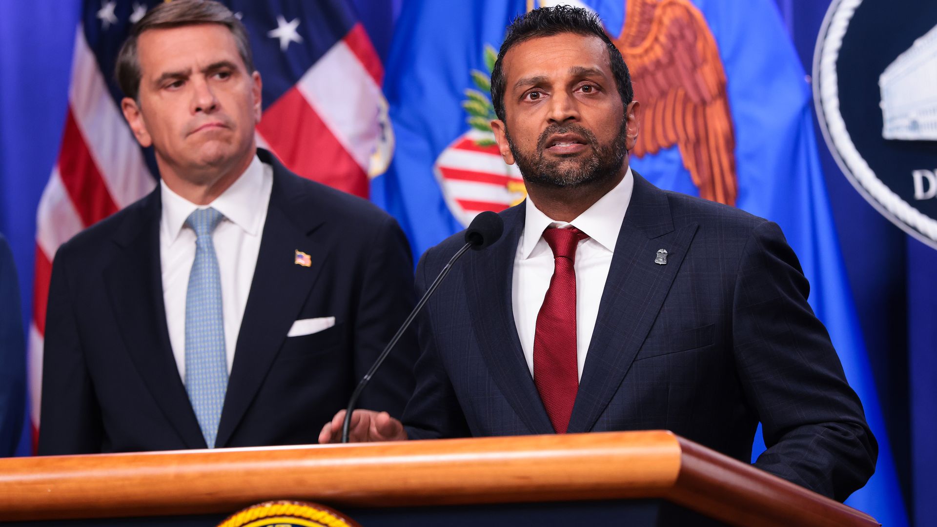 Federal Bureau of Investigation Director Kash Patel speaks as Acting U.S. Attorney General Todd Blanche (L) listens during a news conference at the Robert F. Kennedy Department of Justice building on August 05, 2026 in Washington, DC. 