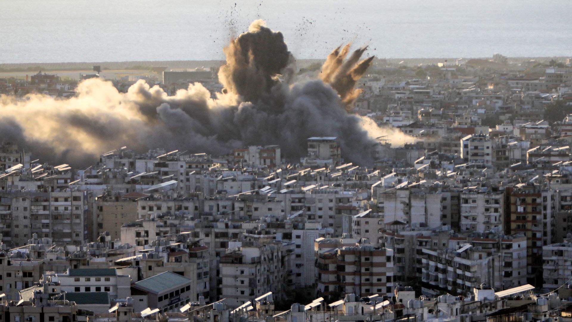 A cloud of smoke erupts following an Israeli airstrike on Beirut's southern suburbs on October 19, 2024.