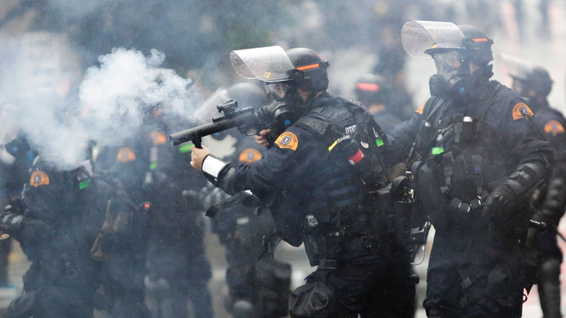 Washington State Police uses tear gas to disperse a crowd during a demonstration protesting the death of George Floyd
