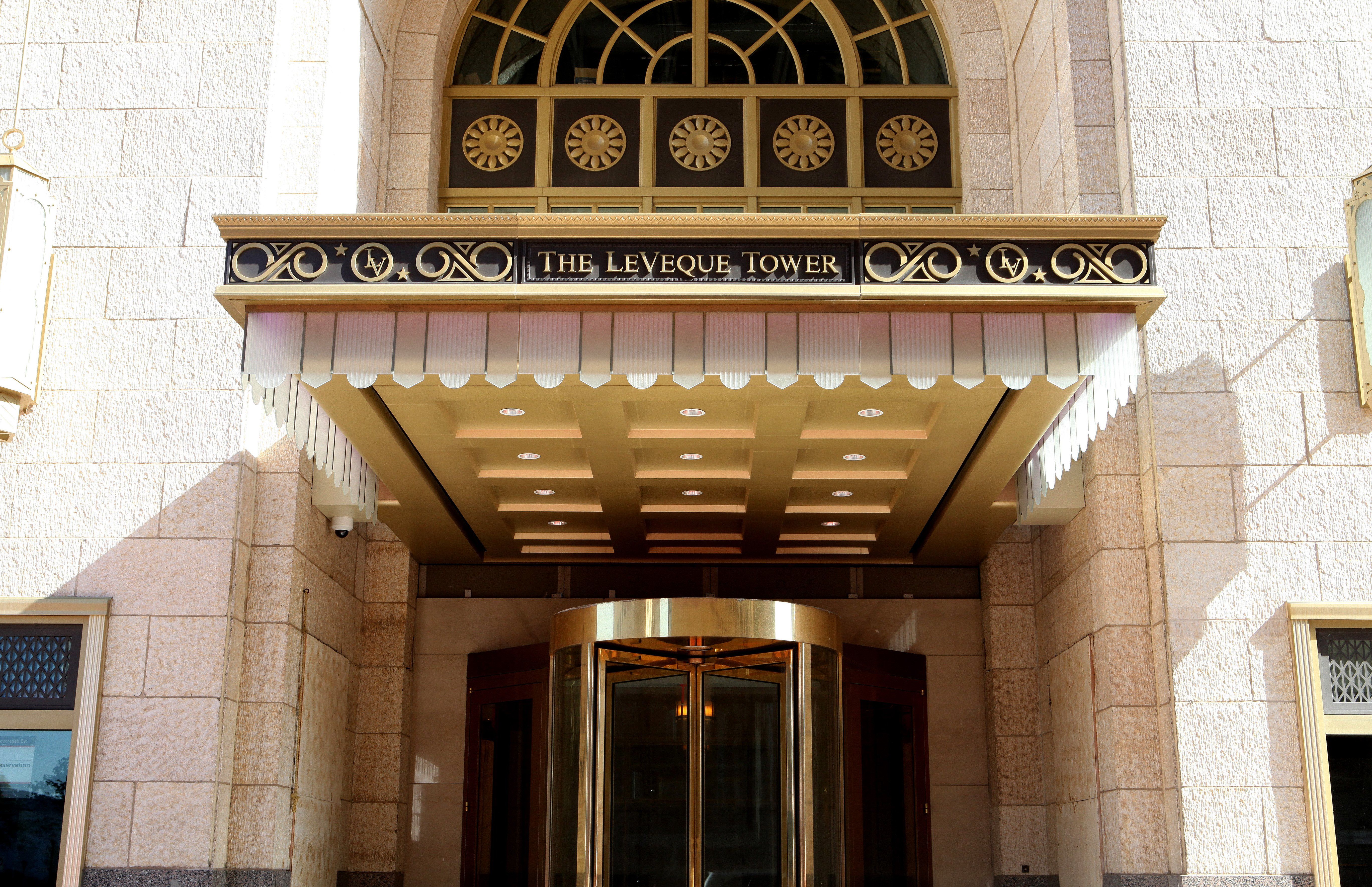 The golden entrance of the LeVeque Tower