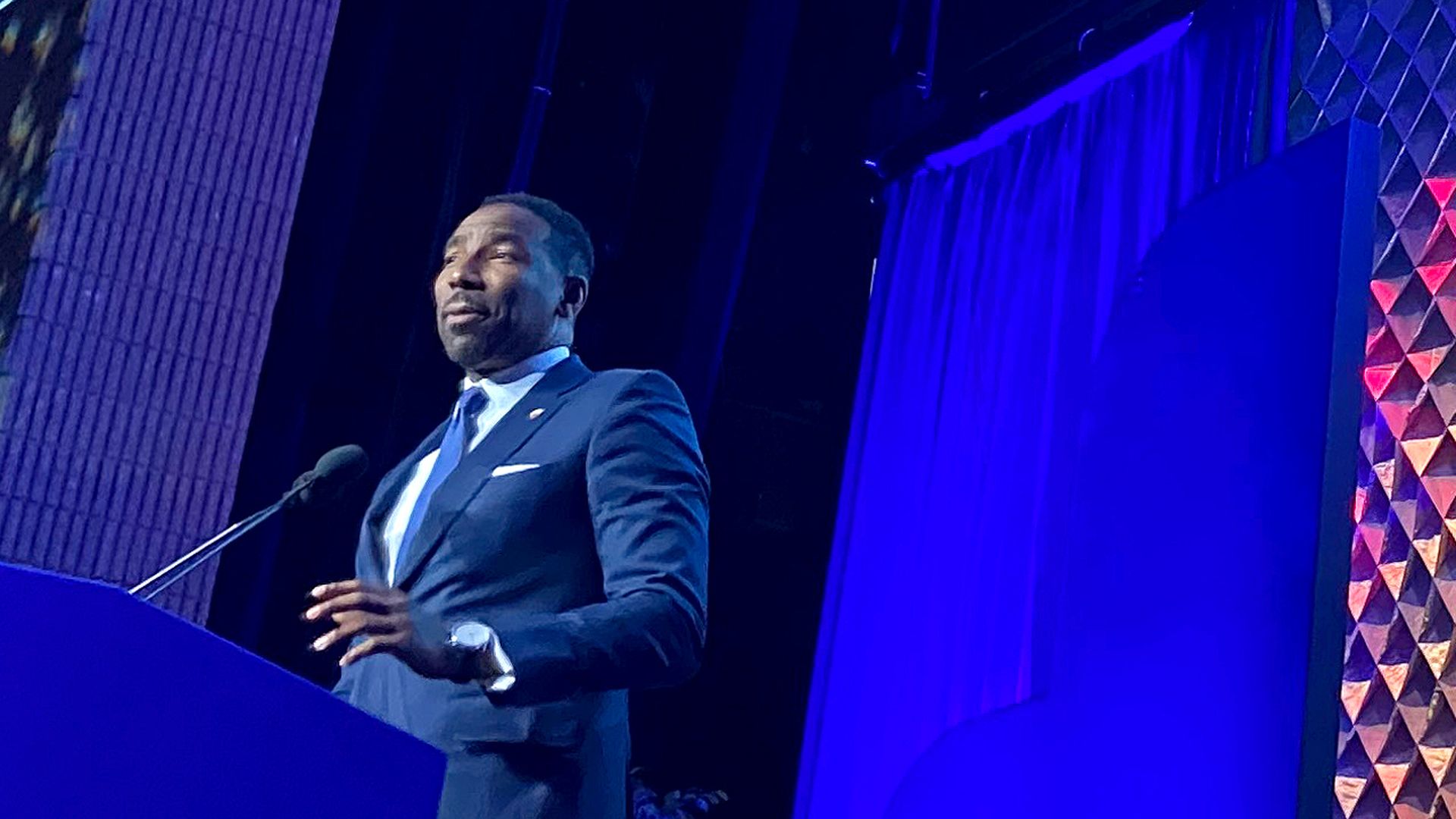 Mayor Andre Dickens stands at a lectern for the 2022 State of the City Address