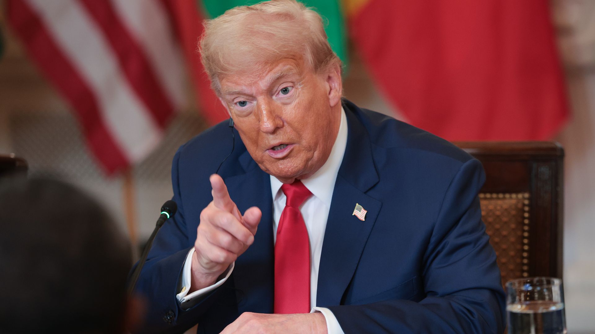 President Trump answers questions during a multilateral lunch with African leaders in the State Dining Room of the White House July 9. 