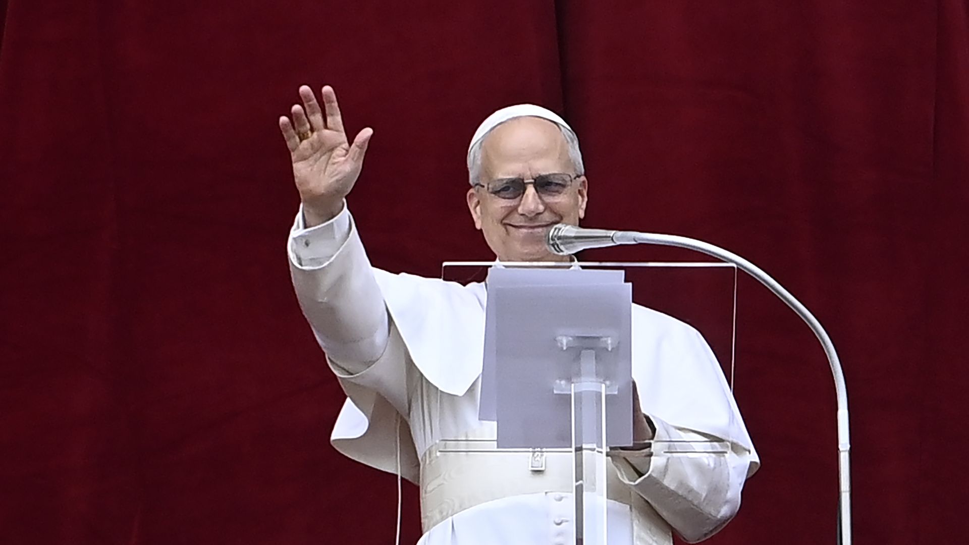 Pope Leo extends his hand during a blessing.