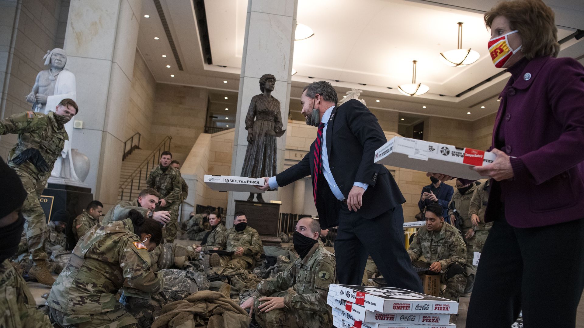 Lawmakers hand out pizza to national guard