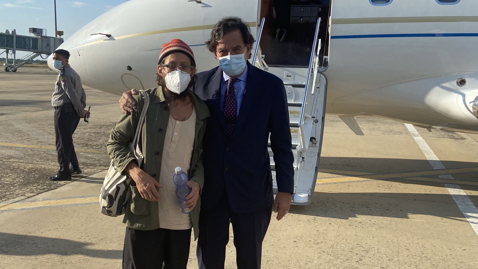 American journalist Danny Fenster with former New Mexico Gov. Bill Richardson on a tarmac in Naypyidaw, Myanmar, on Nov. 15.