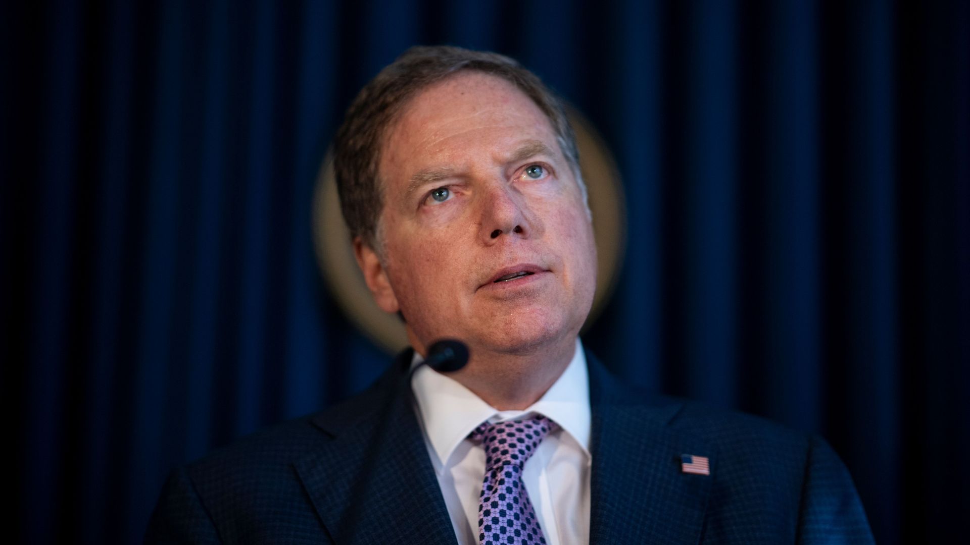 Berman in a suit and tie