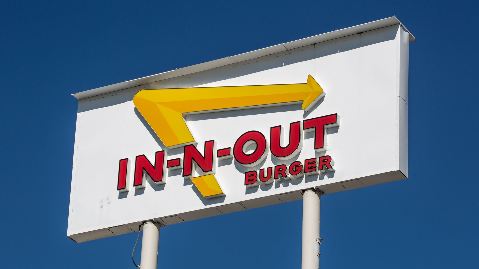 In-N-Out burger restaurant sign.