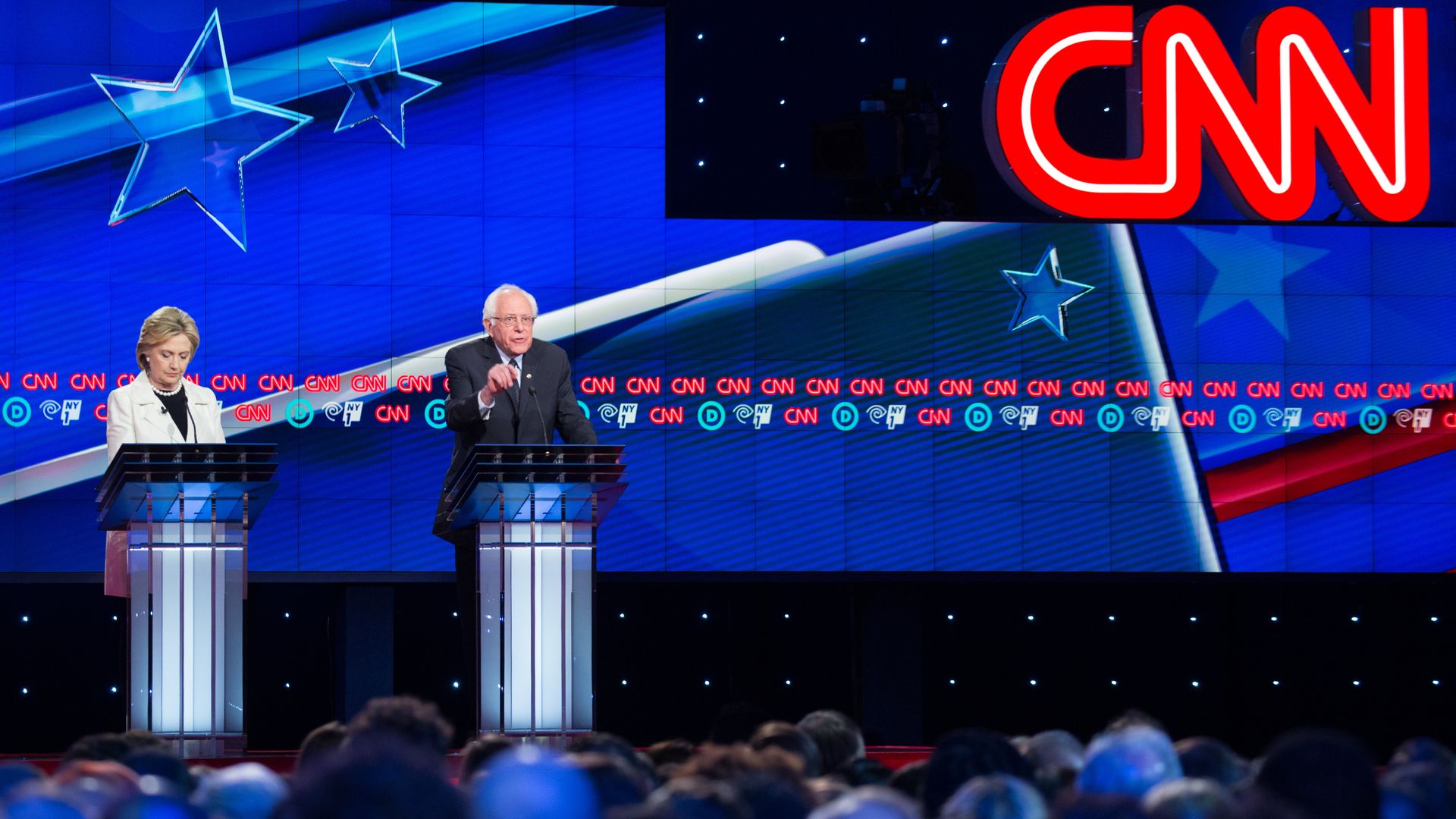 Hillary Clinton and Bernie Sanders during the 2016 Democratic candidate debates hosted by CNN