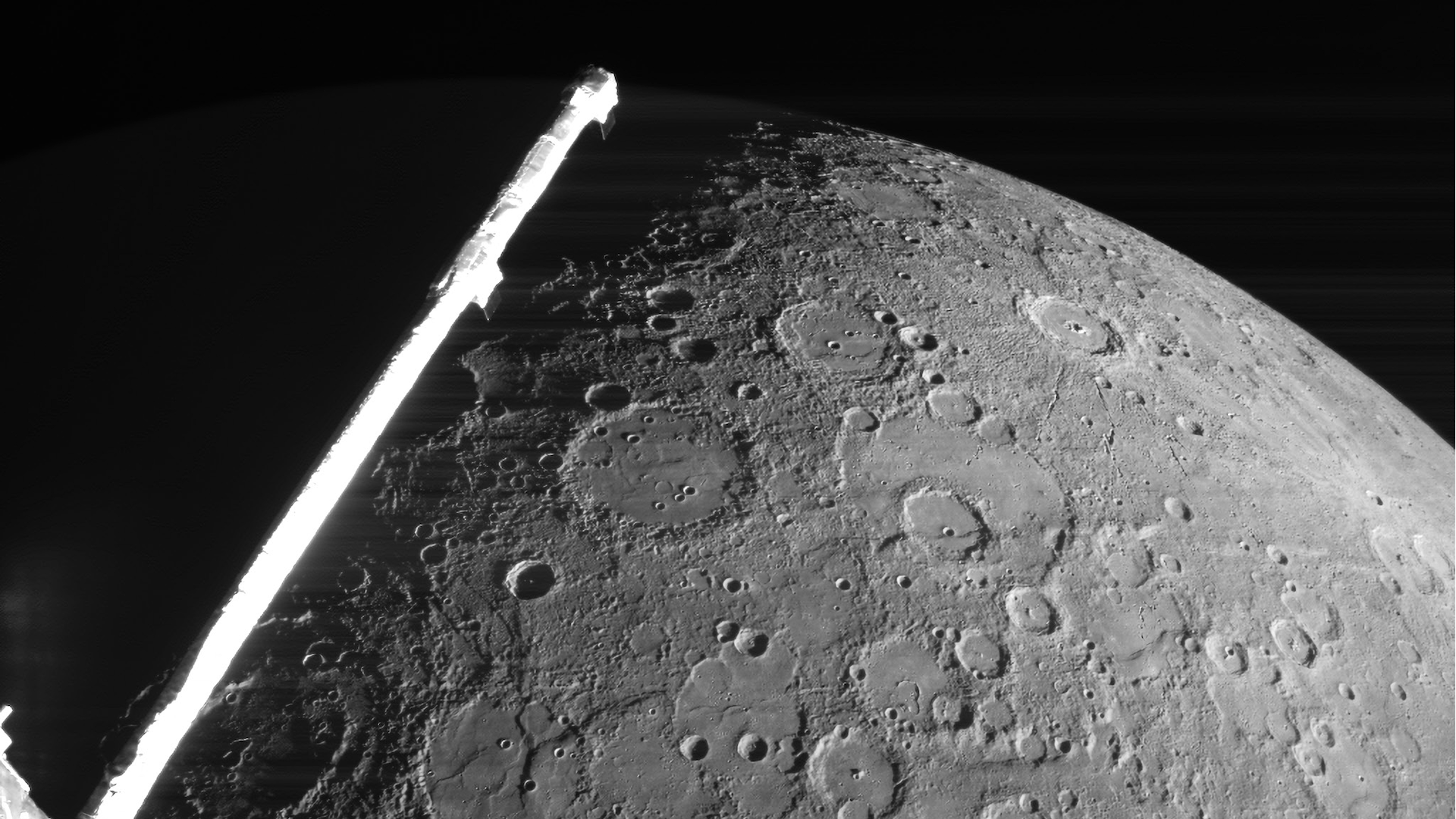 A view of Mercury from above in black and white seen from above