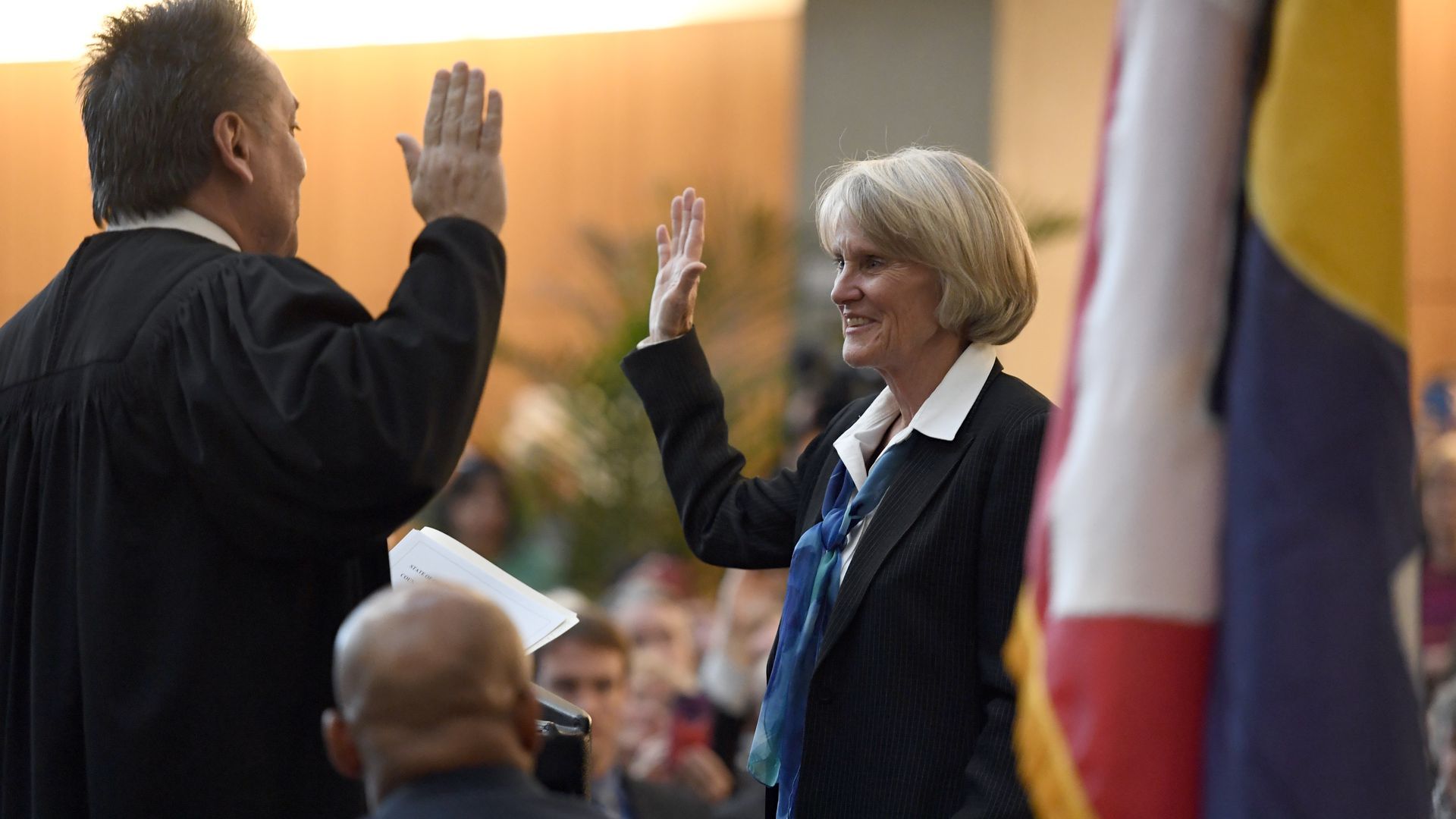 Denver District Attorney Beth McCann being sworn in