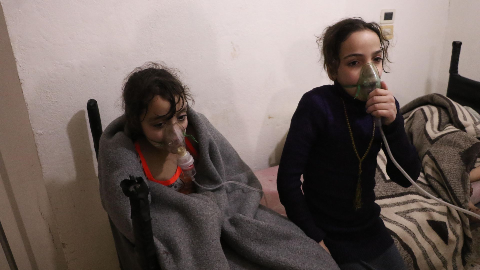 Affected children receive medical treatment after Assad regime forces conduct allegedly poisonous gas attack in Eastern Ghouta on March 7. 