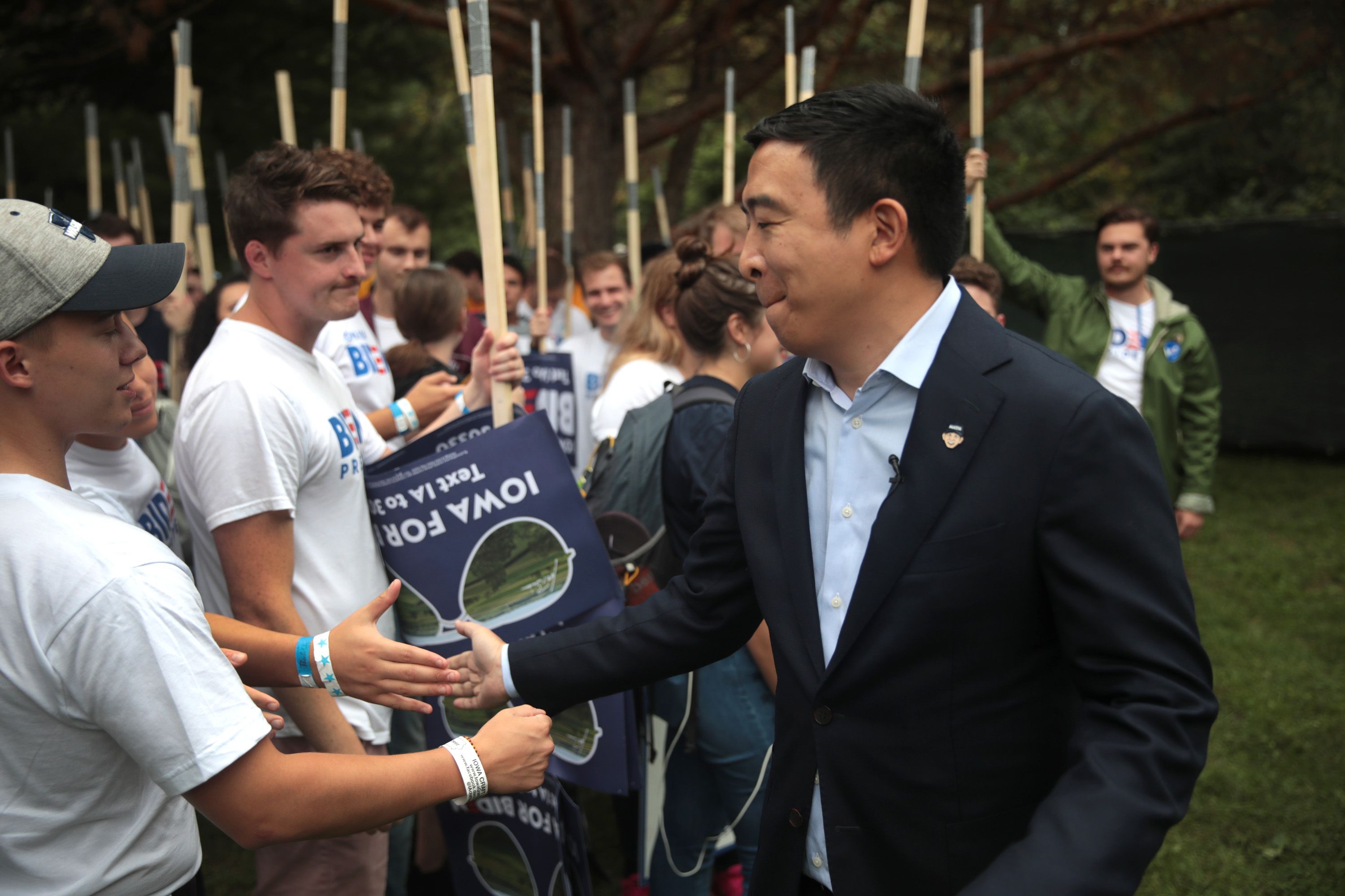 Democratic presidential candidate, entrepreneur Andrew Yang greets guests at the Polk County Democrats' Steak Fry on September 21, 2019 in Des Moines, Iowa. 