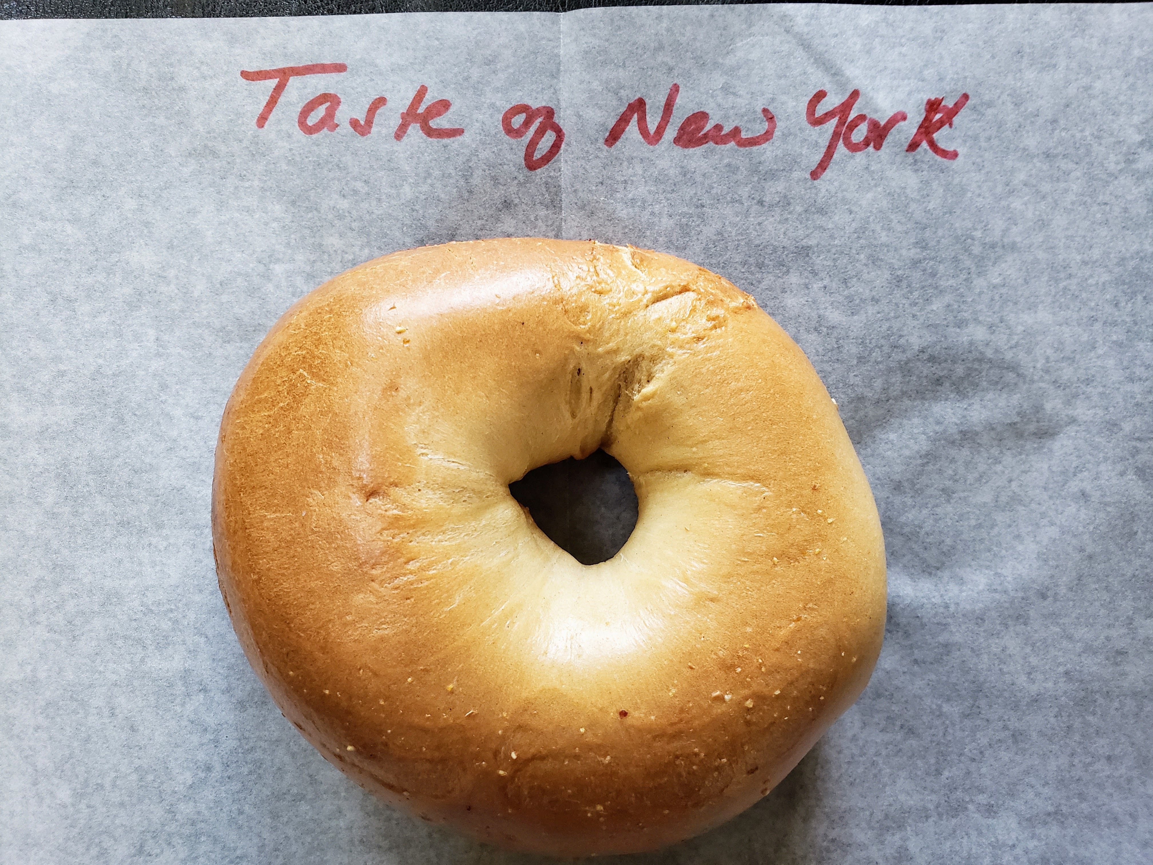 Photo of a bagel with the words Taste of New York 