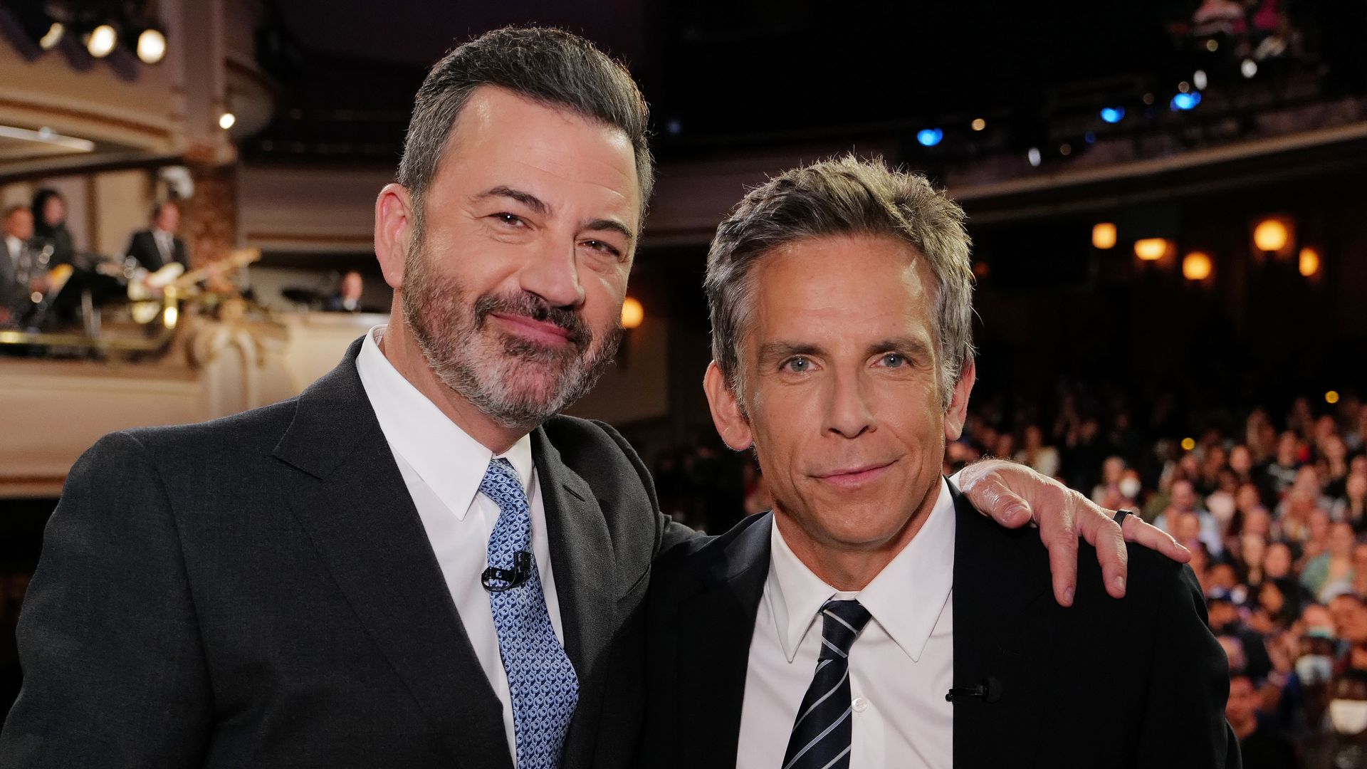 Jimmy Kimmel sits at his late-night desk speaking with actor-director Ben Stiller on the set of “Jimmy Kimmel Live!”