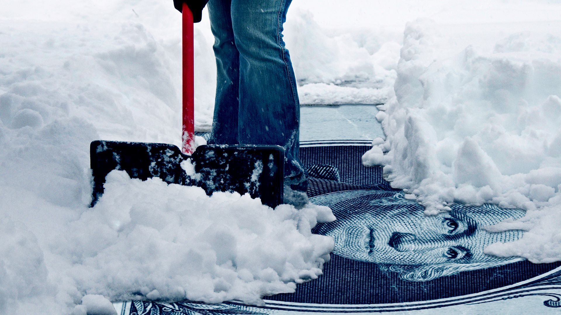 Illustration of a person shoveling snow, which reveals a dollar bill.