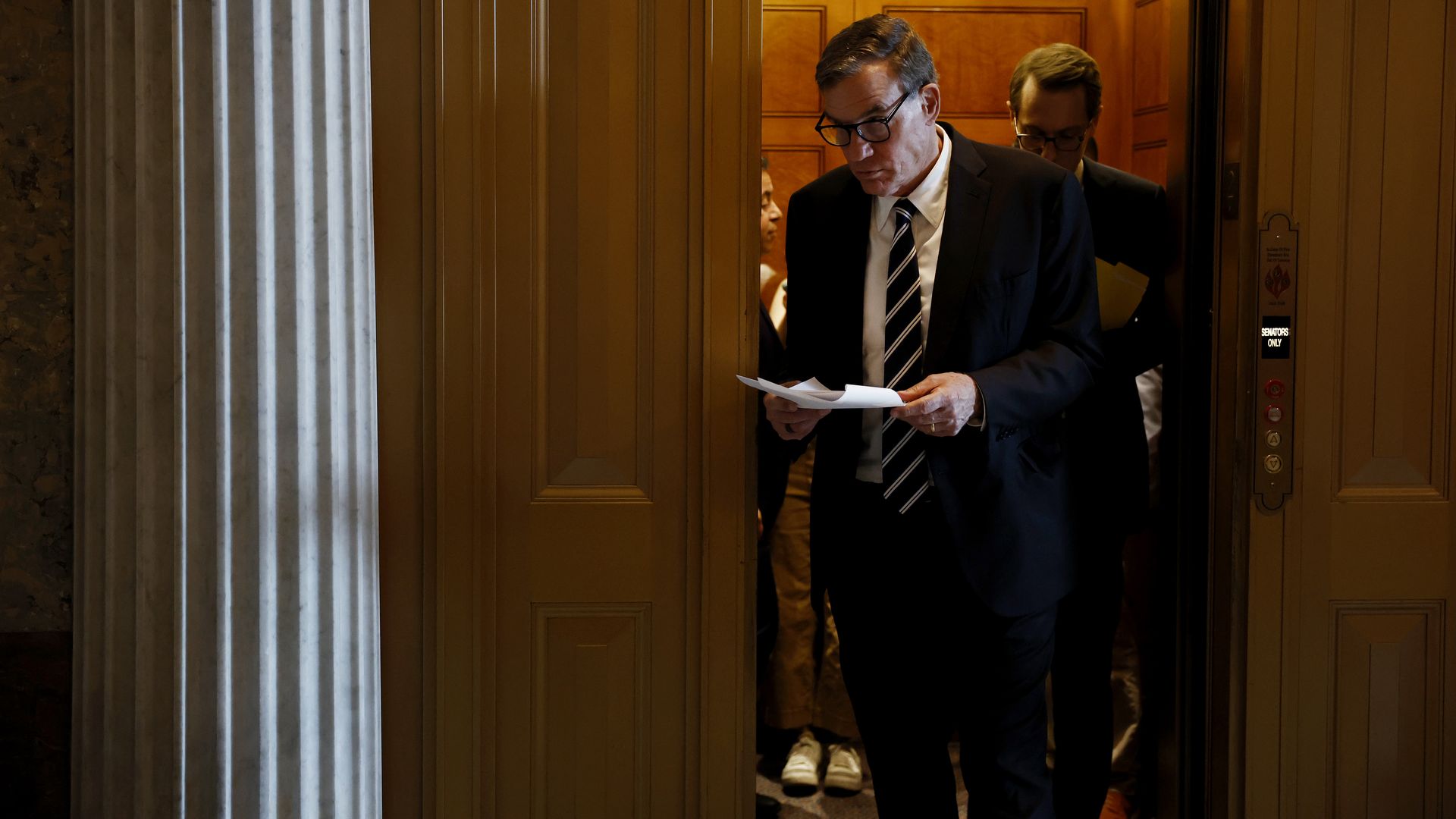 Sen. Mark Wanrer (D-VA) walks to the Senate Chambers during a vote at the U.S. Capitol on June 20, 2024 in Washington, DC.