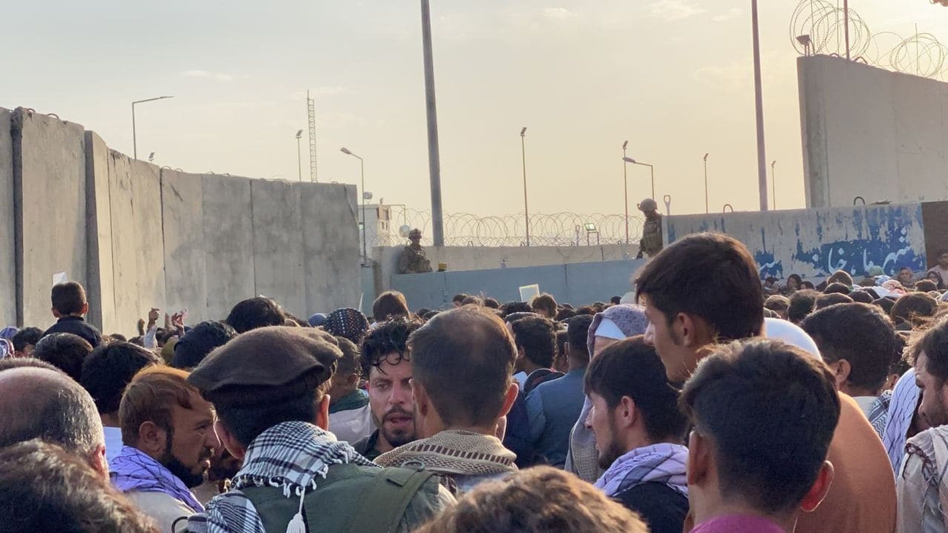 People who want to flee the country continue to wait around Hamid Karzai International Airport in Kabul, Afghanistan