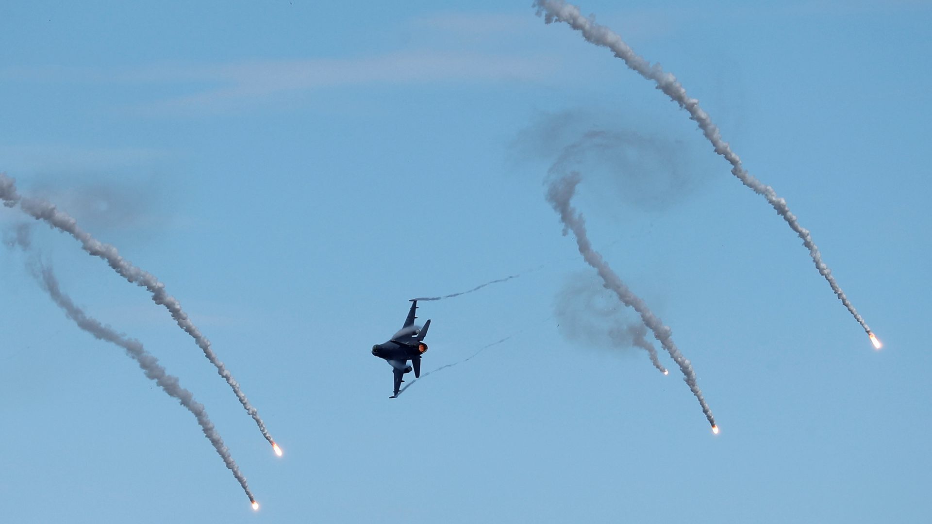 picture of a Taiwan fighter jet drops flares during a 2019 military exercise simulating a Chinese invasion.