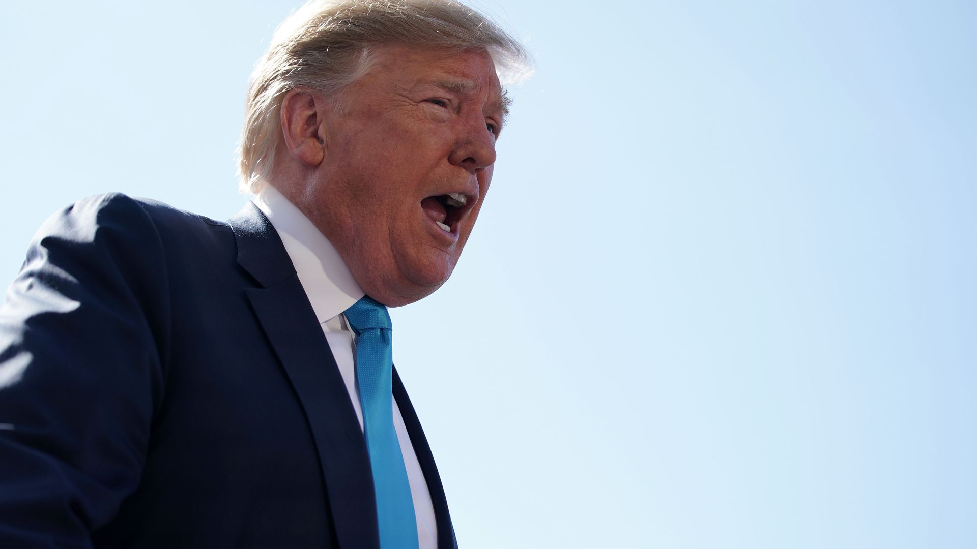 In this image, Trump speaks. 