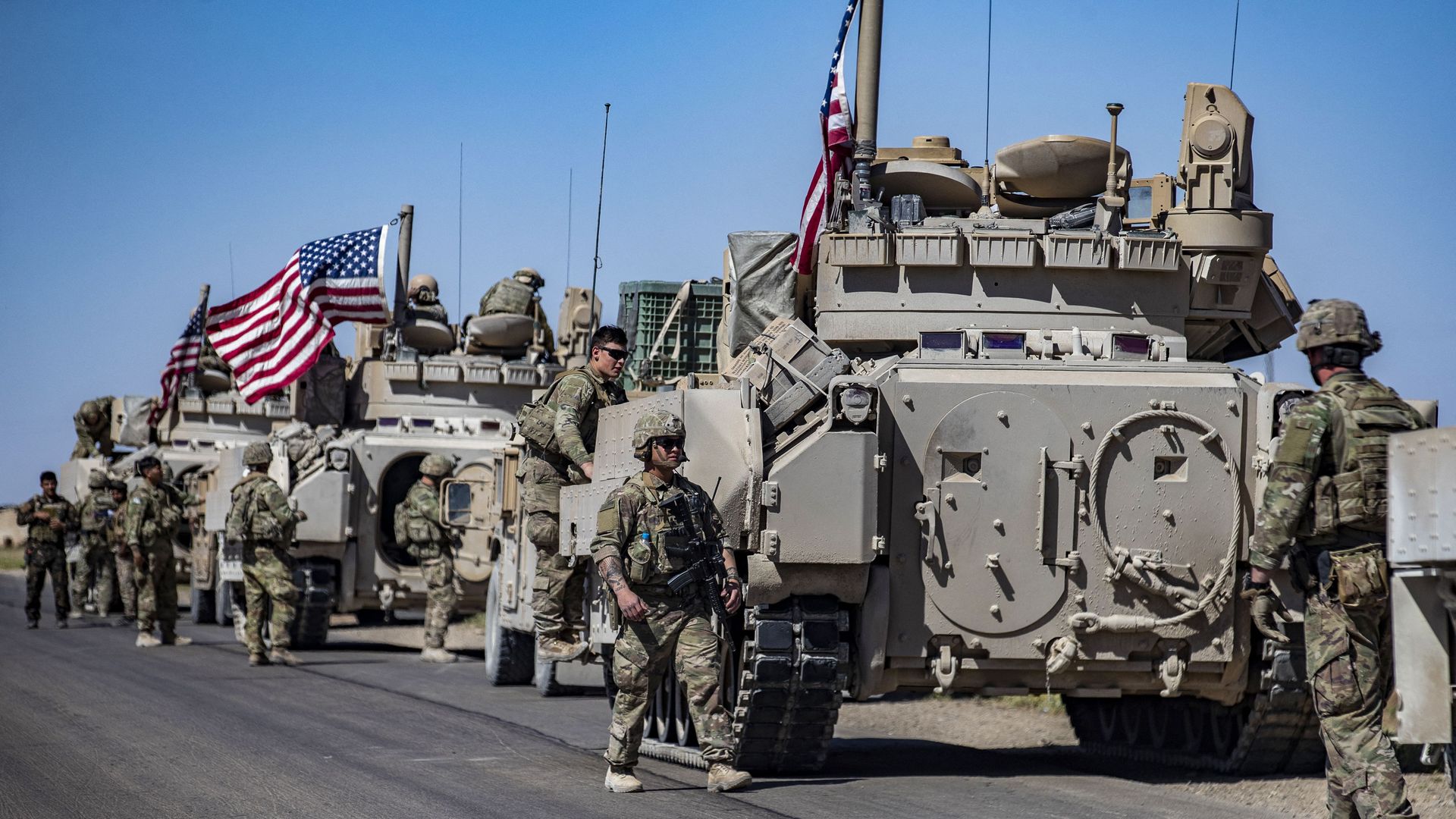 US forces patrol near the countryside of Rumaylan (Rmeilan) in Syria's northeastern Hasakeh province near the Turkish border, on May 26, 2022. 