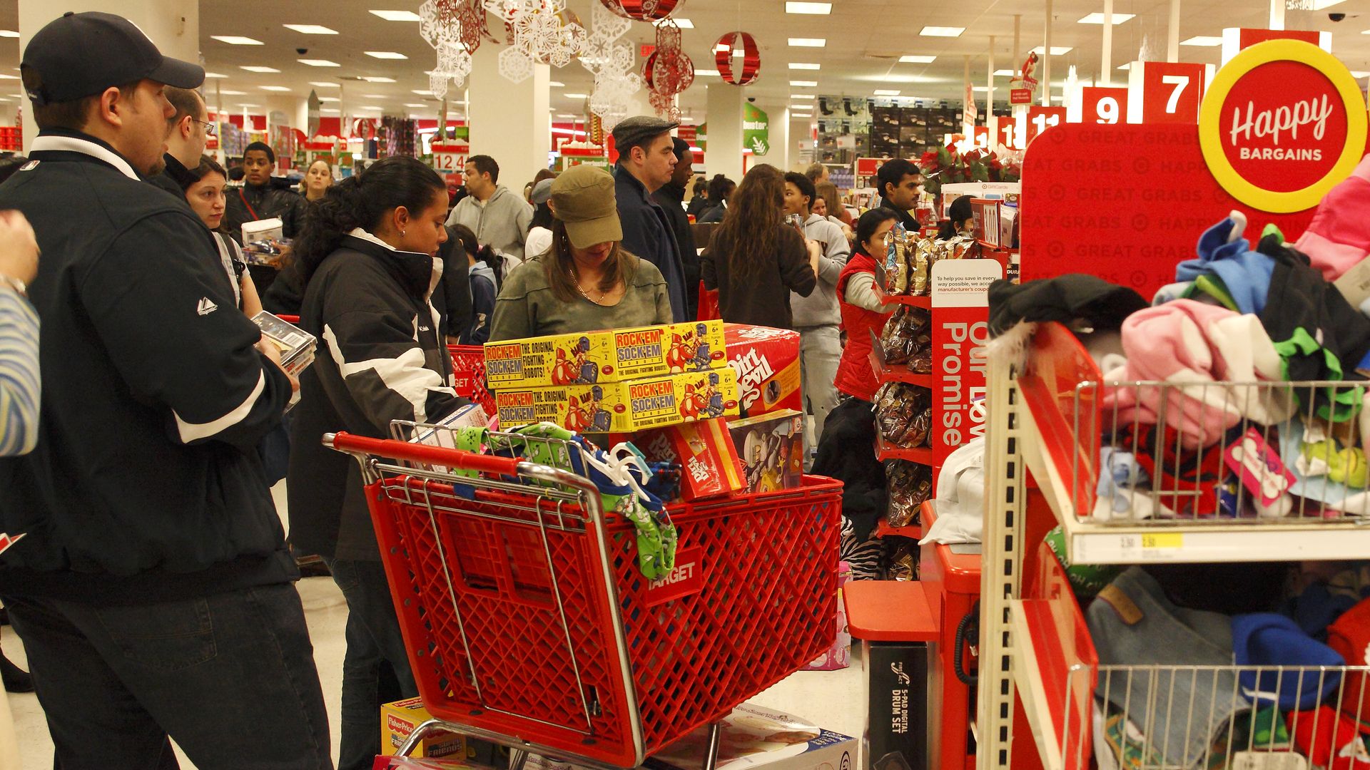 Shoppers, in a Target store, take advantage of the steep discounts offered on Black Friday, the most important shopping day of the year for retailers.