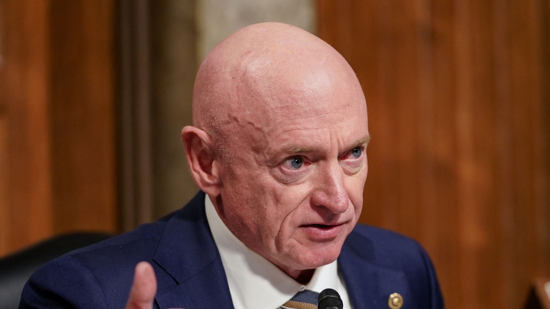 Mark Kelly speaks during a congressional hearing. 