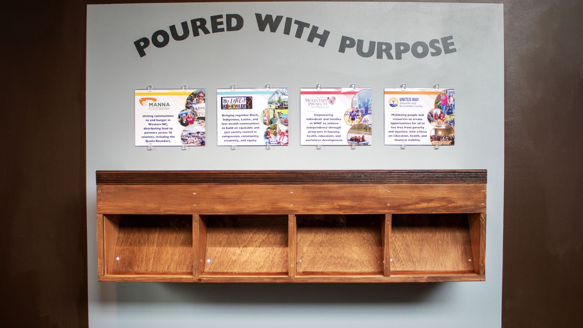 Poured with Purpose wall at NoDa Brewing. 