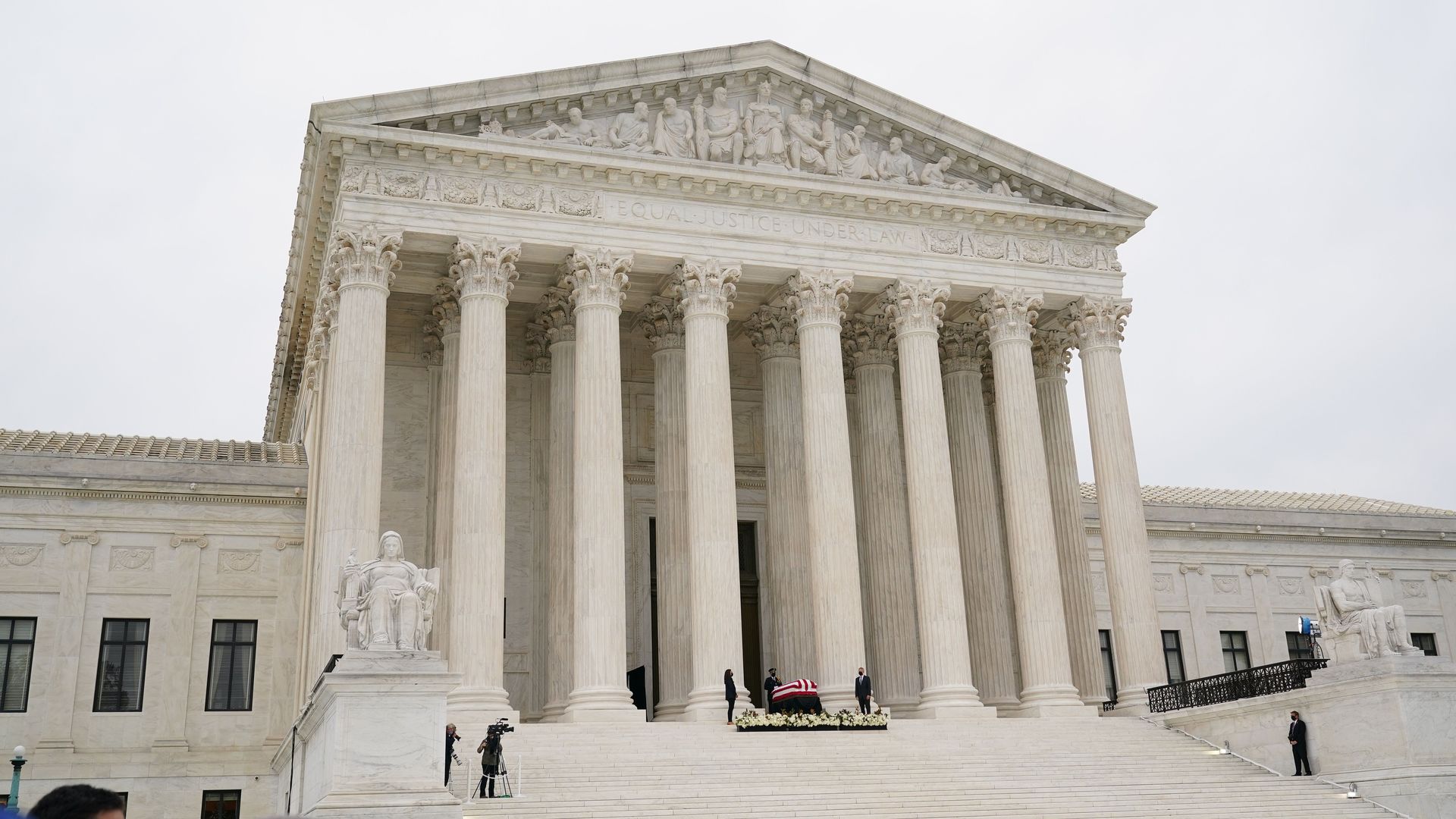 The flag-draped casket of Justice Ruth Bader Ginsburg lies in repose at the Supreme Court