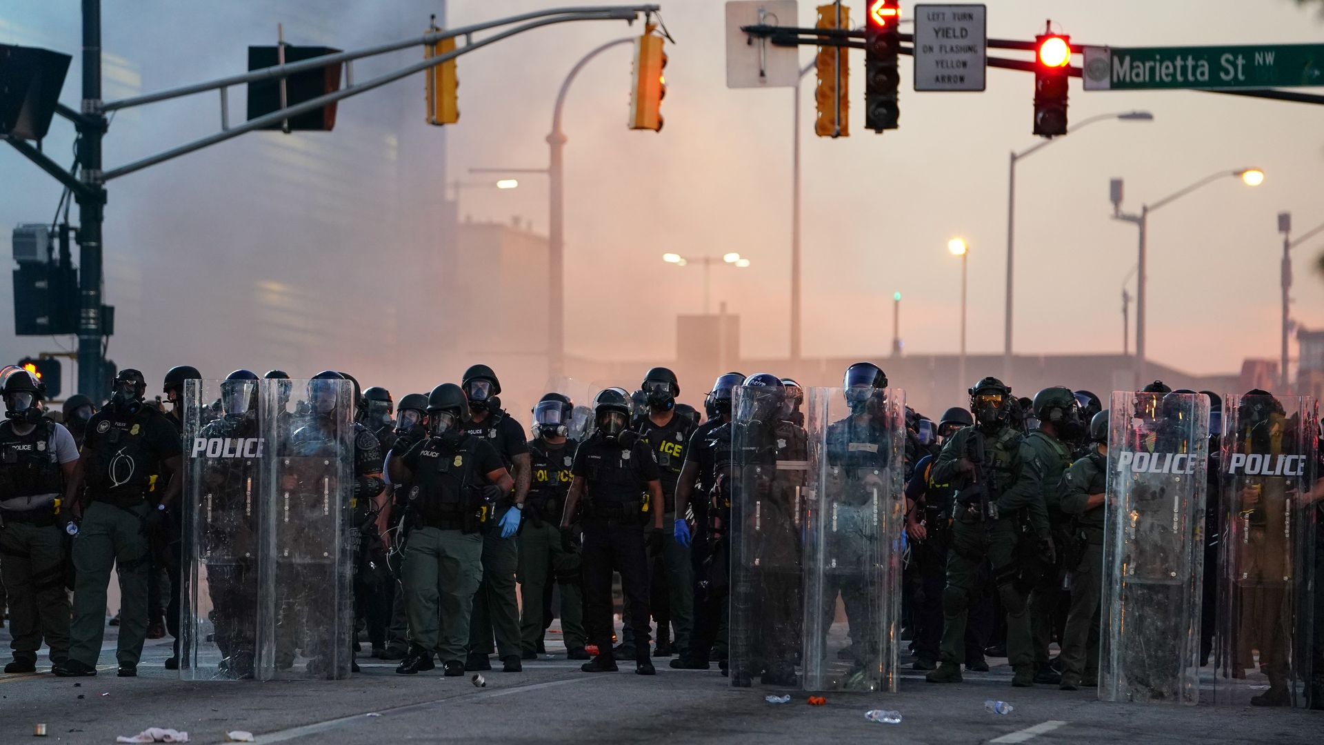 Police form a line in an intersection