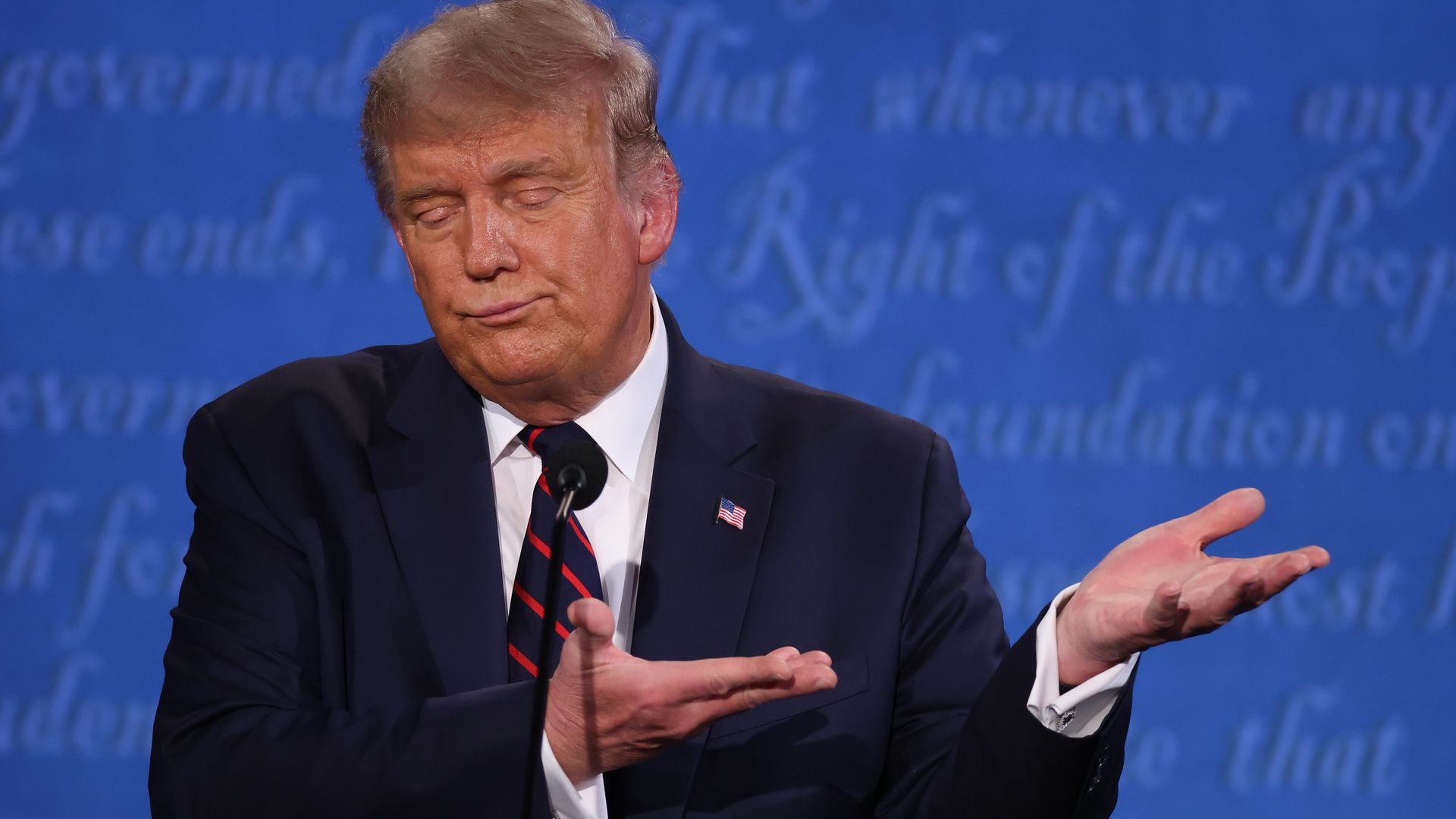 President Trump makes a sarcastic face and gestures to the left during the Sept. 29 presidential debate