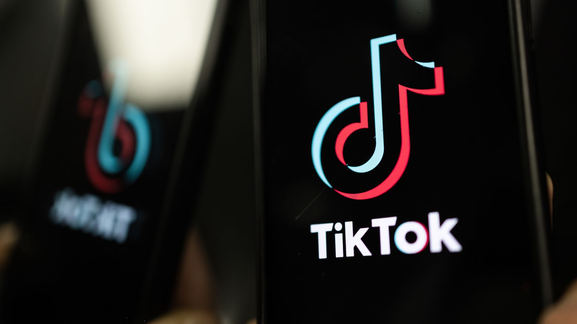 Photo illustration of TikTok logo on an iPhone