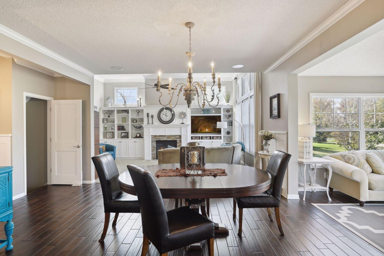 open-concept layout with dining area, living area and four-season porch