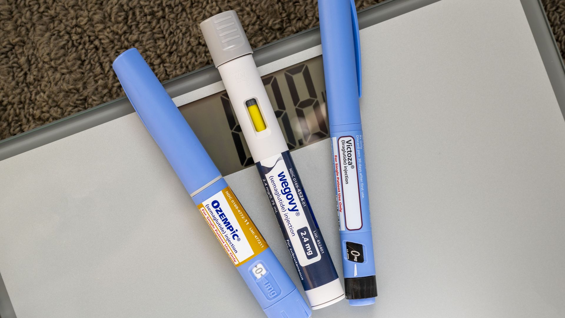 Three GLP-1 treatments on a weight scale