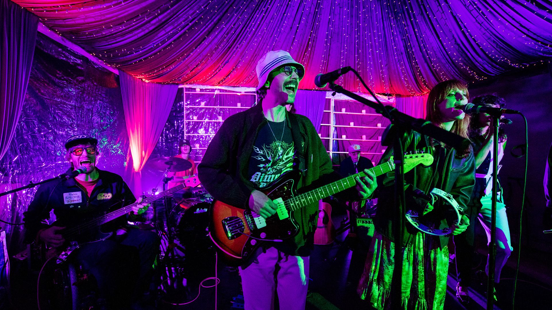 three music performers on stage