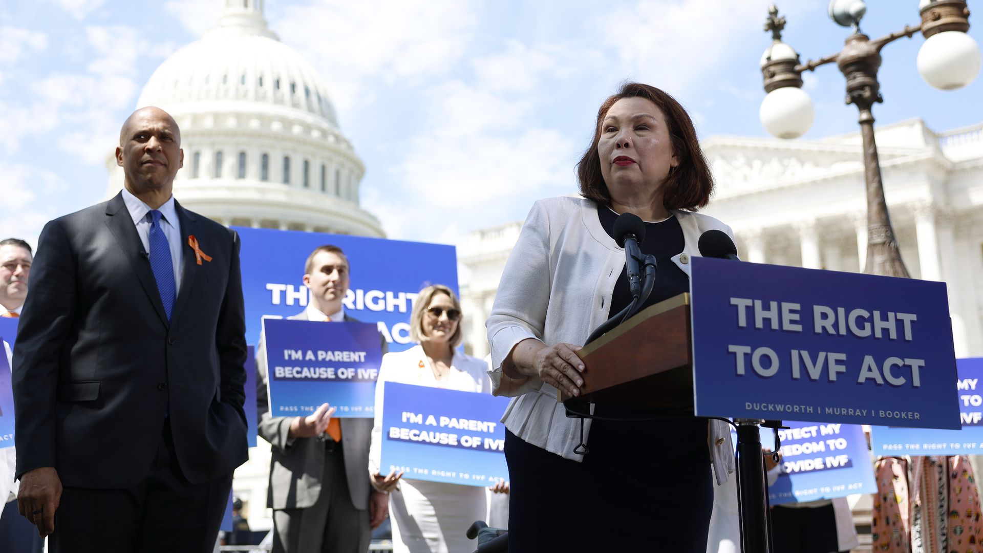 Sen. Tammy Duckworth (D-IL) speaks alongside Sen. Cory Booker (D-NJ) during a news conference on access to in vitro fertilization (IVF) treatments outside of the U.S. Capitol Building on June 12, 2024 in Washington, DC.
