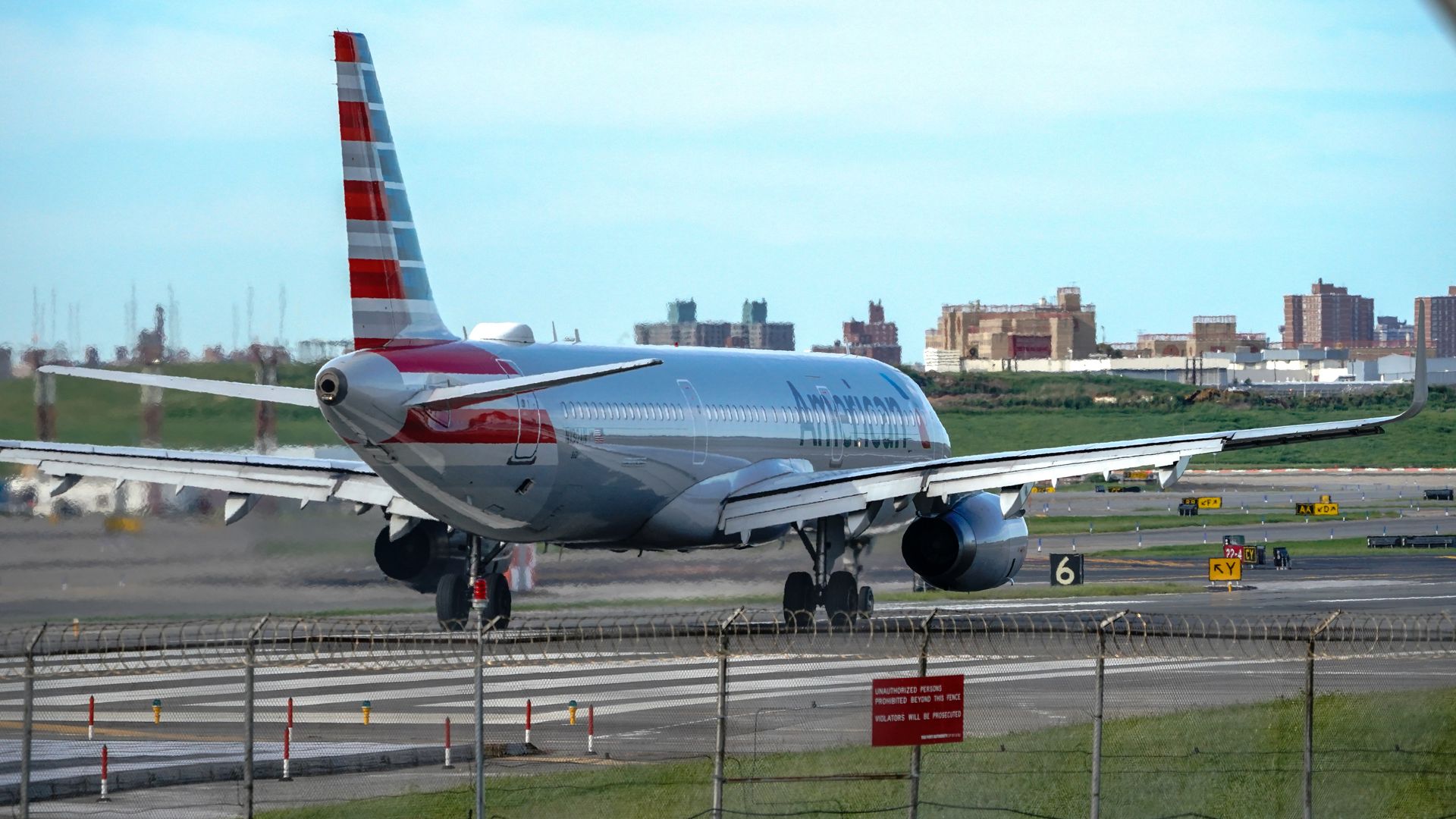 American Airlines aircraft taxiing at La Guardia Airport.