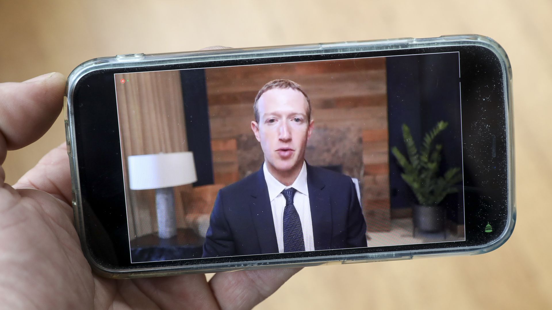 Mark Zuckerberg on a phone screen