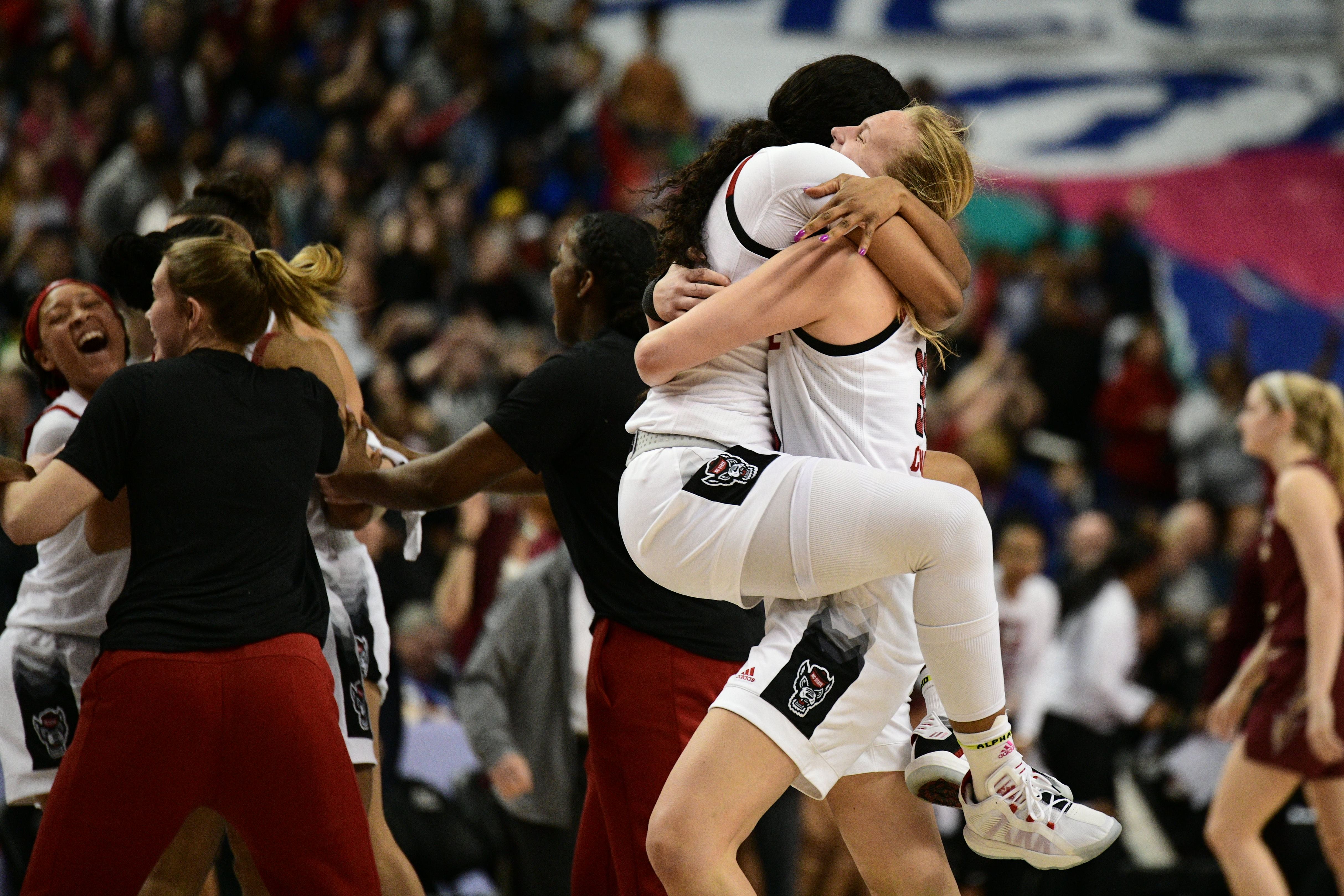 NC State women's basketball team celebrating
