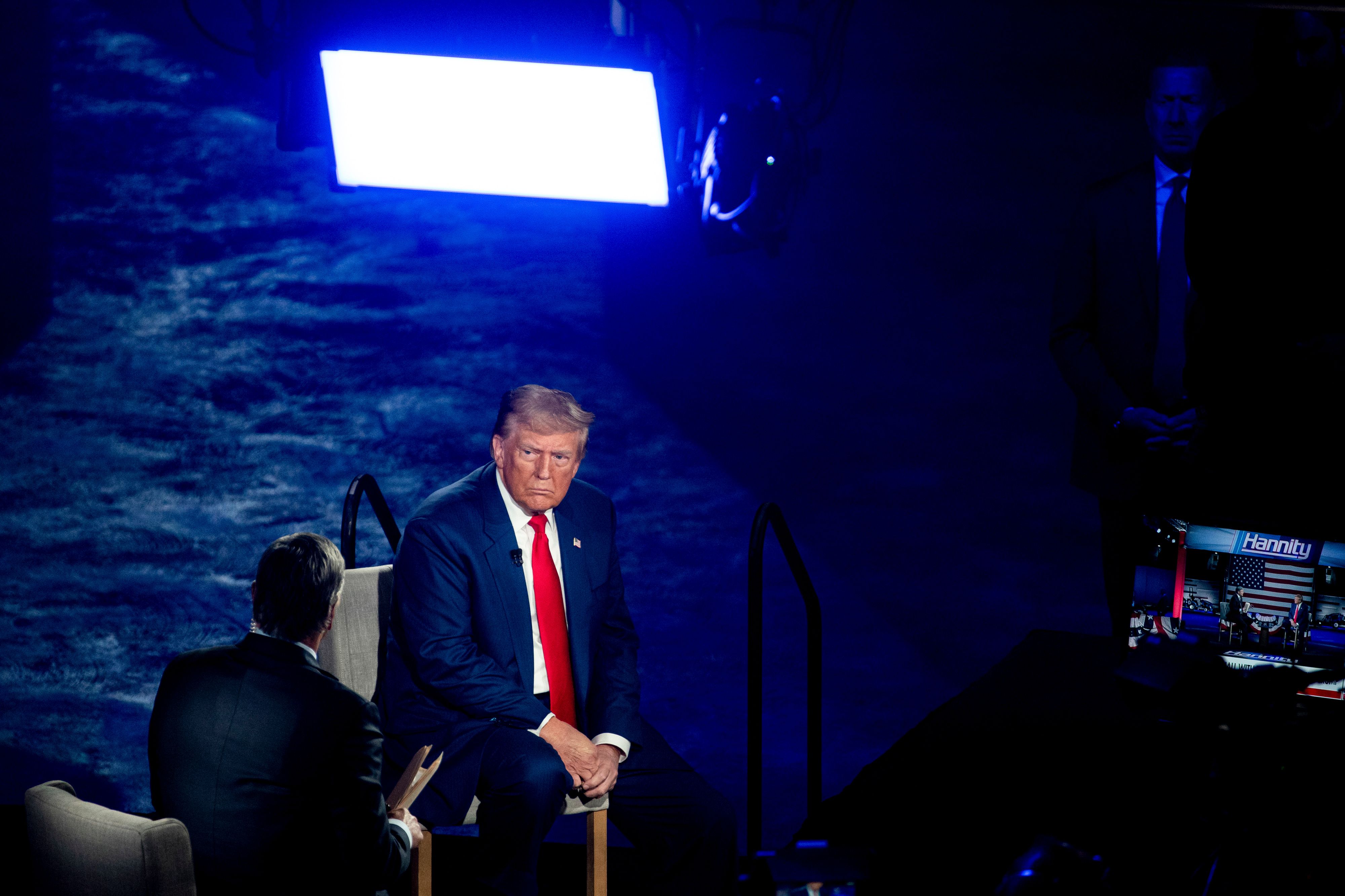 Former President Trump participates in a town hall hosted by Fox News' Sean Hannity in Harrisburg, Pa., last night.