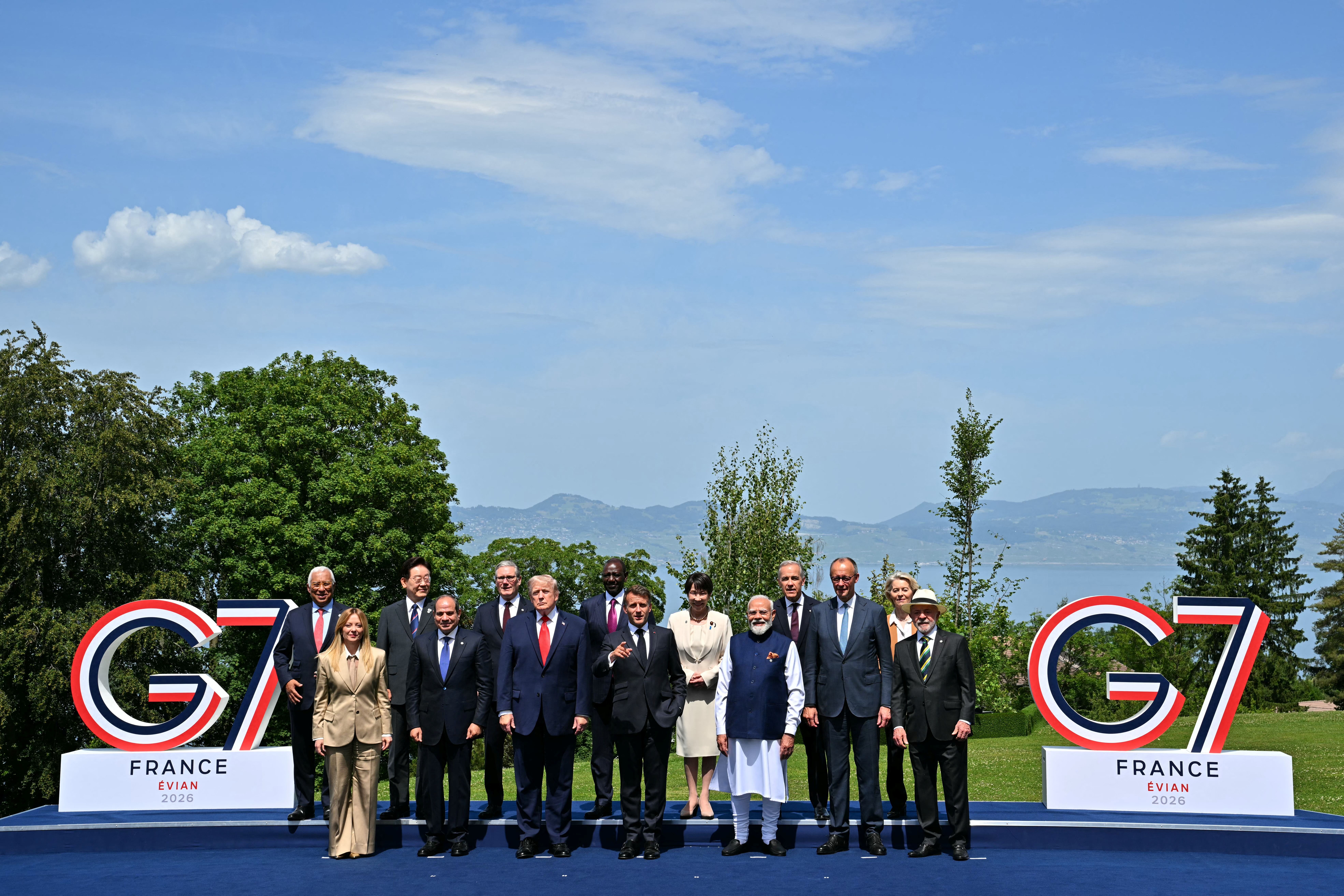 World leaders pose for a group photo at the G7 summit in Évian-les-Bains, France, on Tuesday.