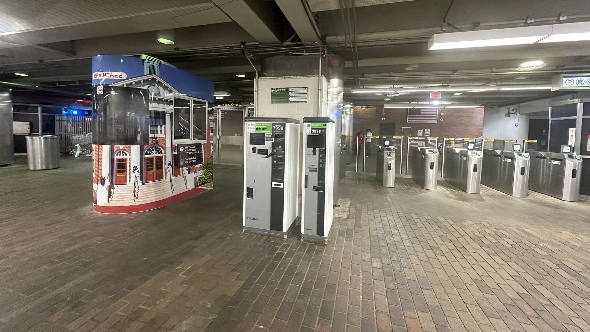A photo of the entrance with the turnstiles at Braintree T Station.