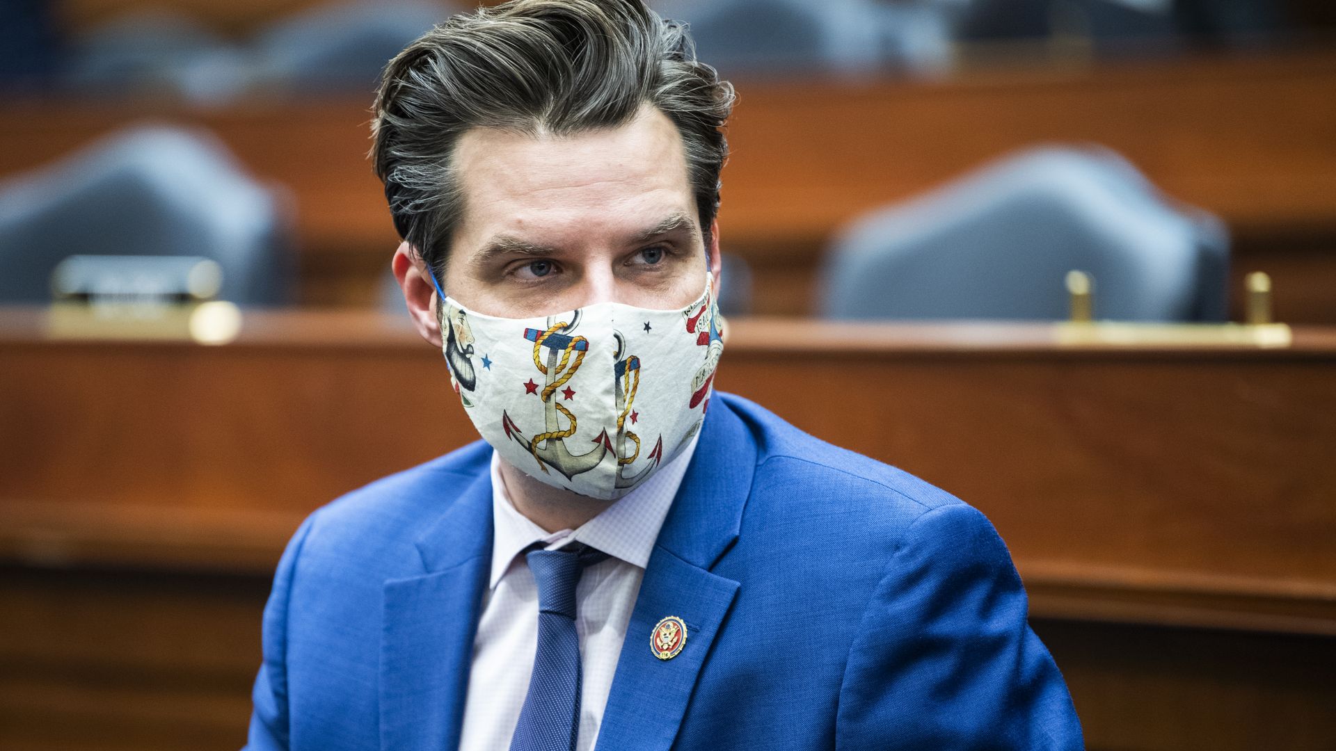 Photo of a masked Matt Gaetz