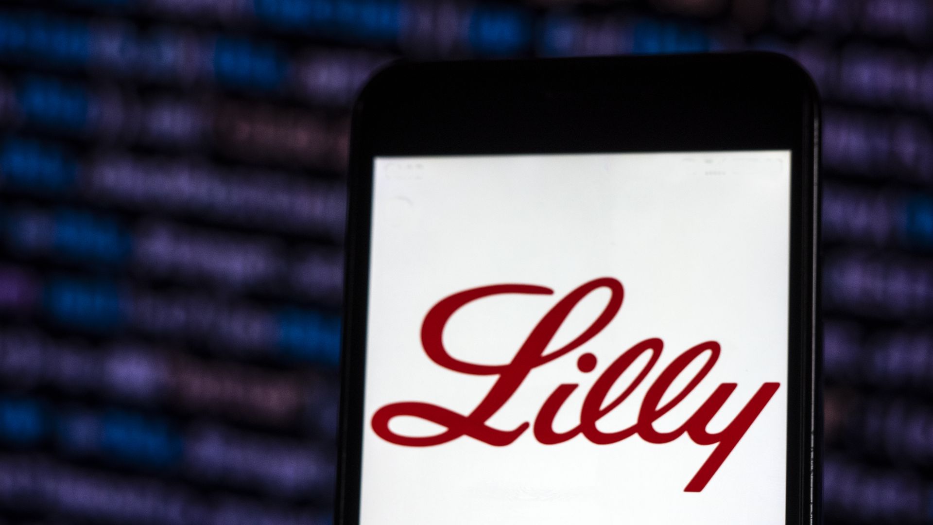 Eli Lilly's logo on a phone screen.