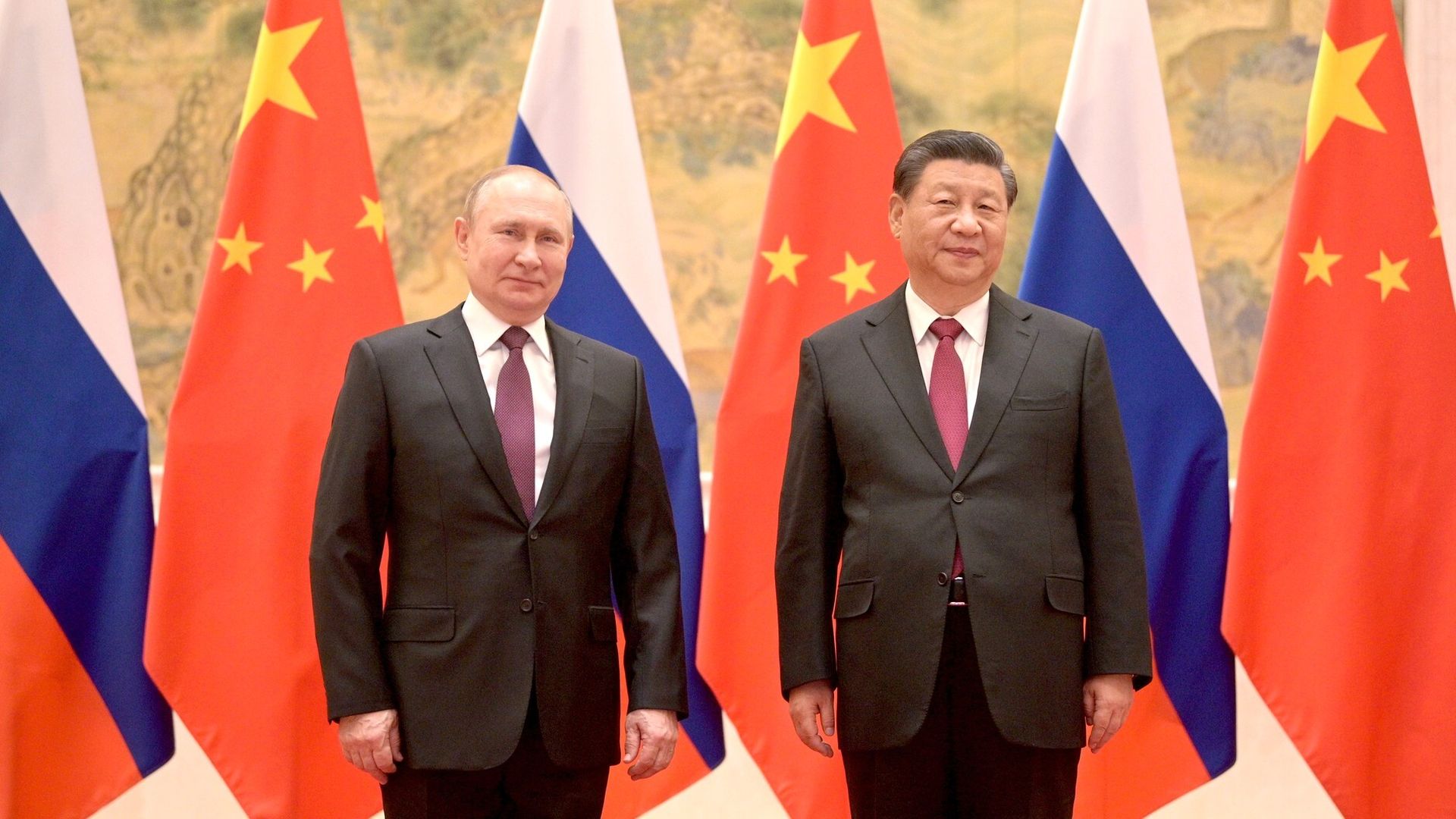 Russian President Vladimir Putin (L) and Chinese President Xi Jinping (R) meet in Beijing, China on February 4.
