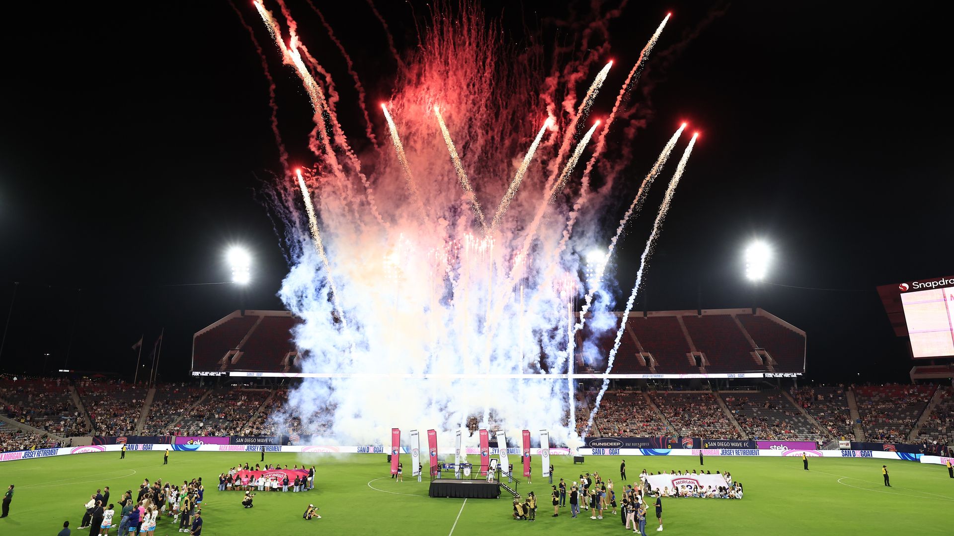 SAN DIEGO, CALIFORNIA - SEPTEMBER 07: Fireworks are set off during the ceremony to retire Alex Morgan's Number 13 jersey following NWSL match between San Diego Wave and Houston Dash at Snapdragon Stadium on September 07, 2025 in San Diego, California. (Photo by Francisco Vega/NWSL via Getty Images)