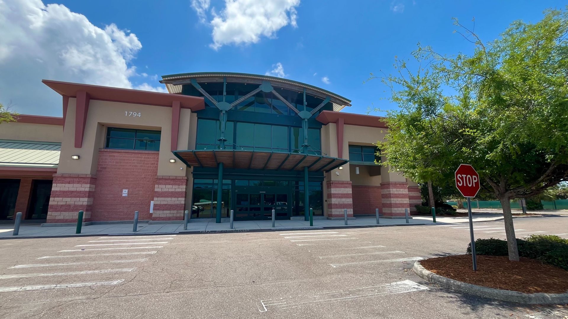The grocery store front at Tangerine Plaza sits vacant. 